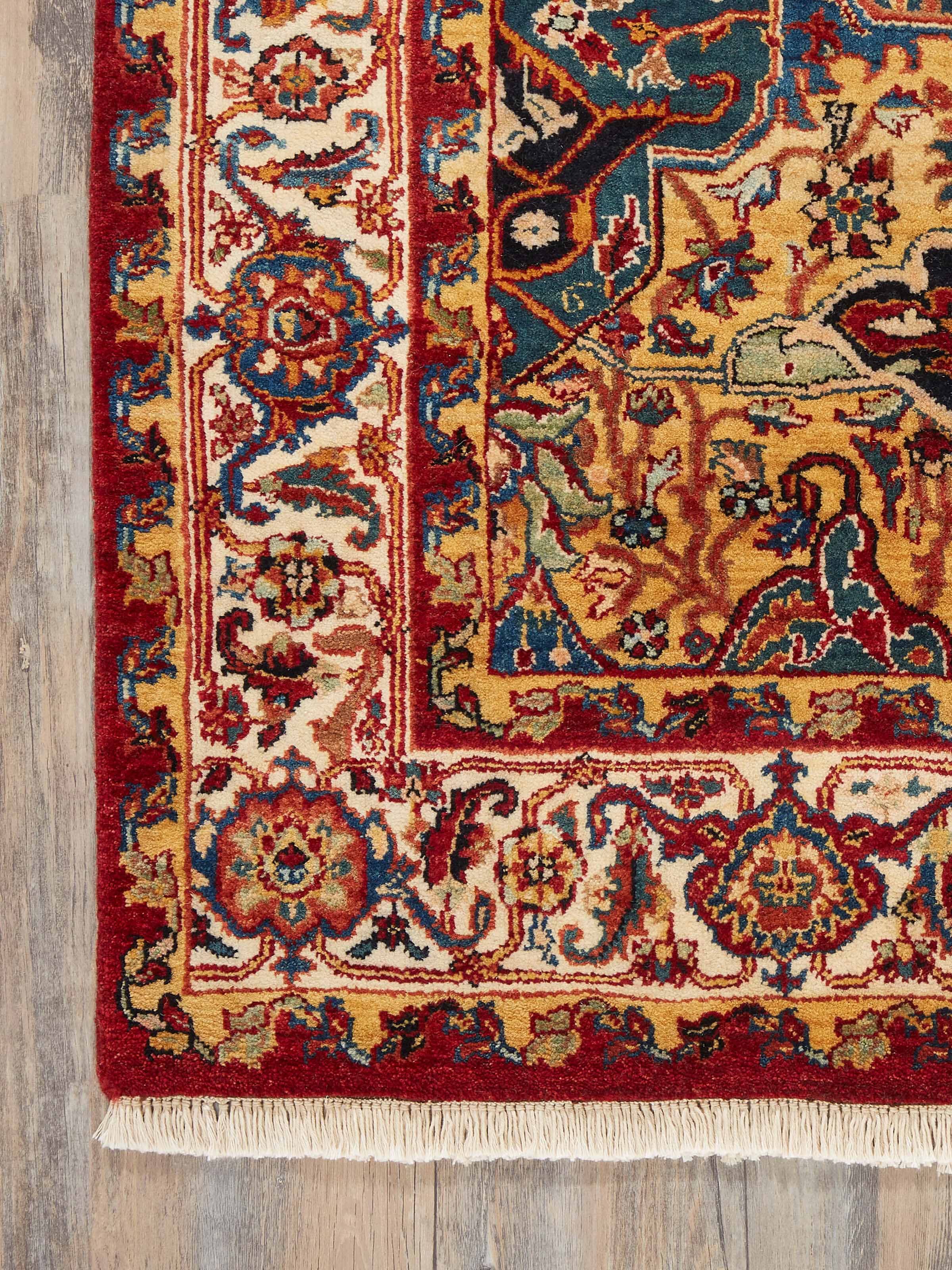 Close-up of Traditional Heriz Rust Jaipur Wool Hand-Knotted Rug focusing on the detailed knot work and colors.