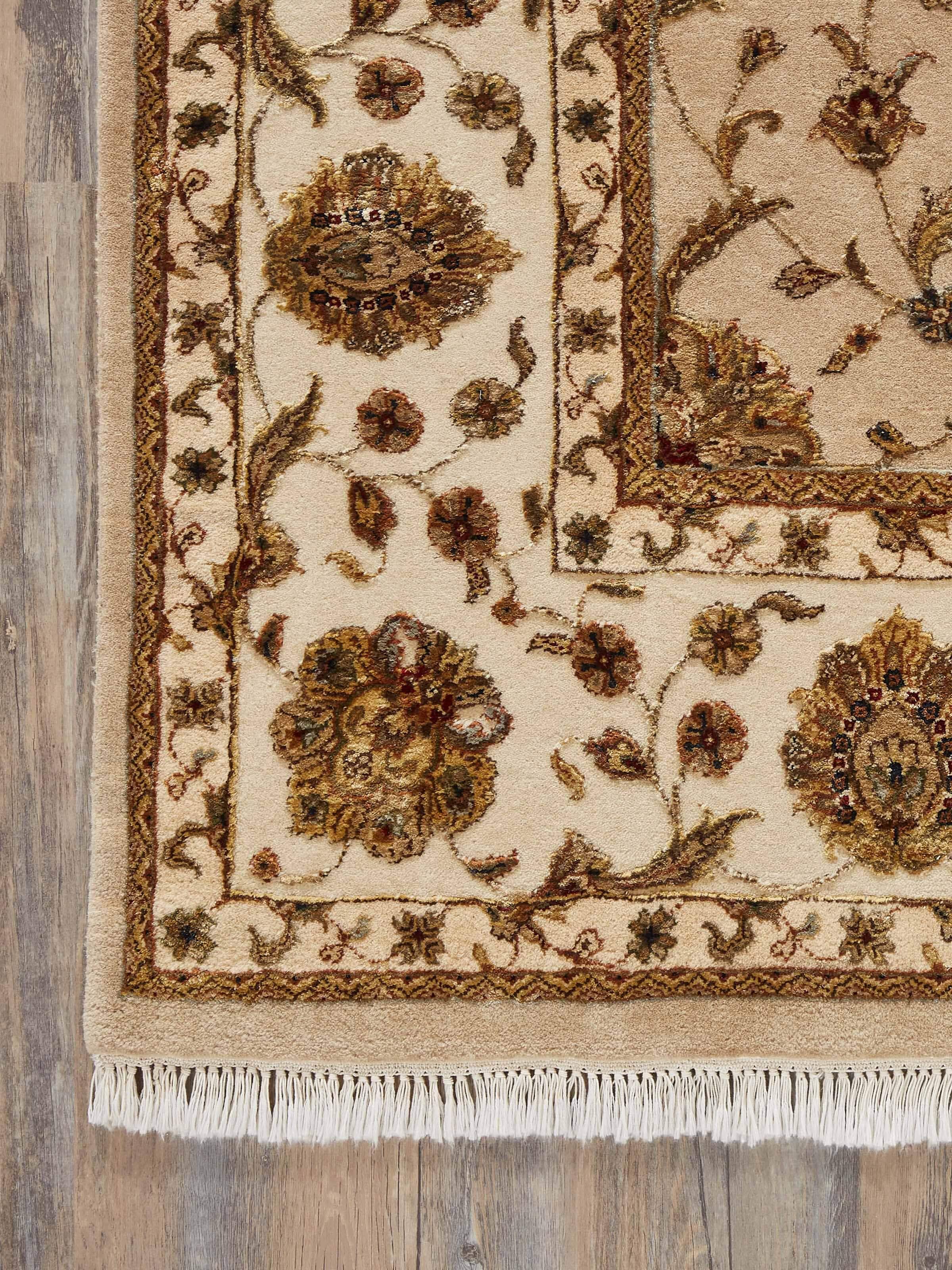 Close-up of Ziegler traditional light pink Jaipur wool & silk hand-knotted rug displaying the fabric's softness and texture