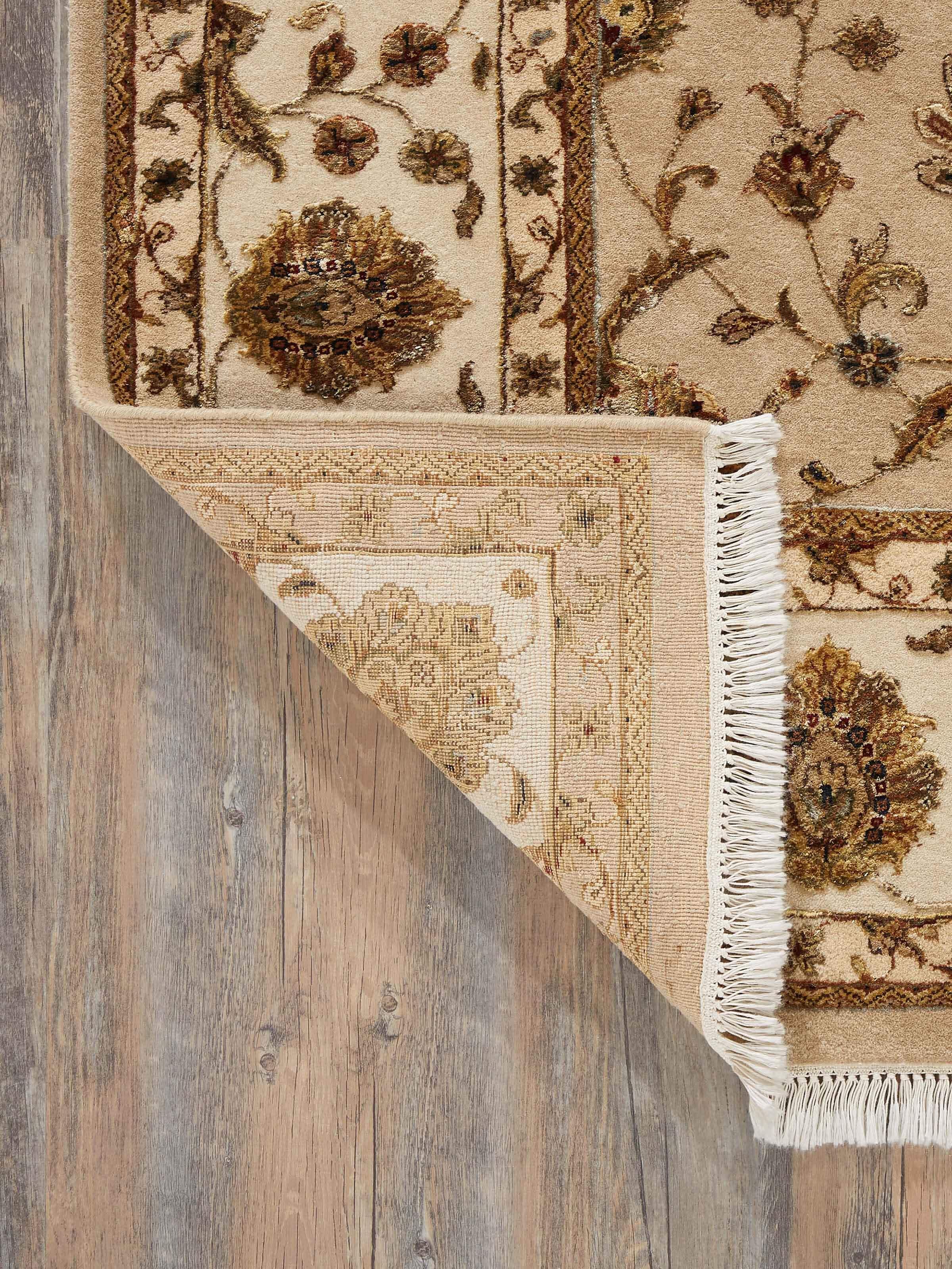 Overhead view of Ziegler traditional light pink Jaipur wool & silk hand-knotted rug highlighting the full design and layout