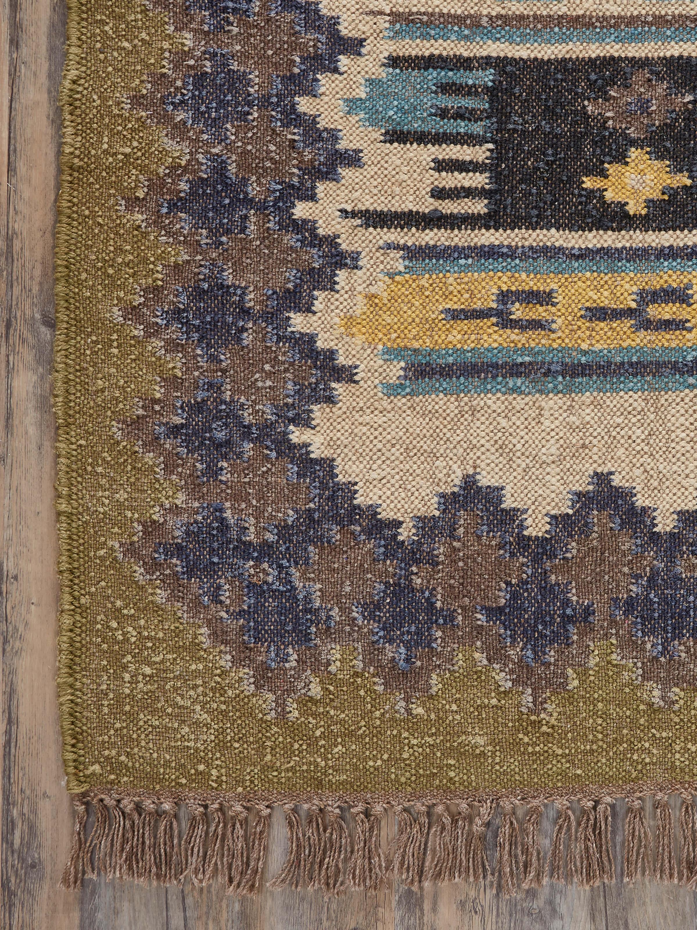 Angled view of Traditional Kilim green blue lawan jute & wool panja dhurrie, showing the full pattern and color scheme.