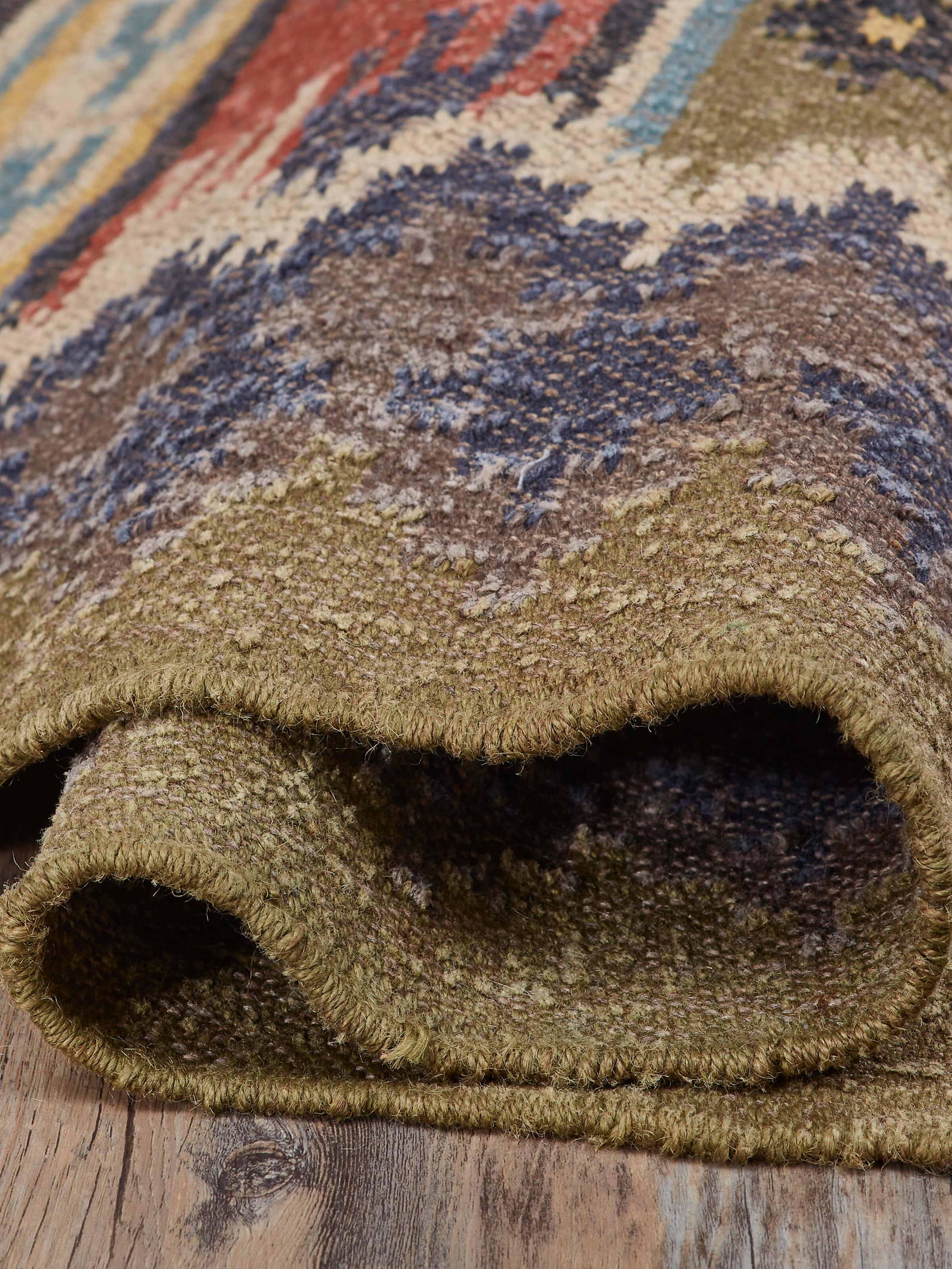 Detailed close-up of Traditional Kilim green blue lawan jute & wool panja dhurrie, focusing on the texture and craftsmanship.