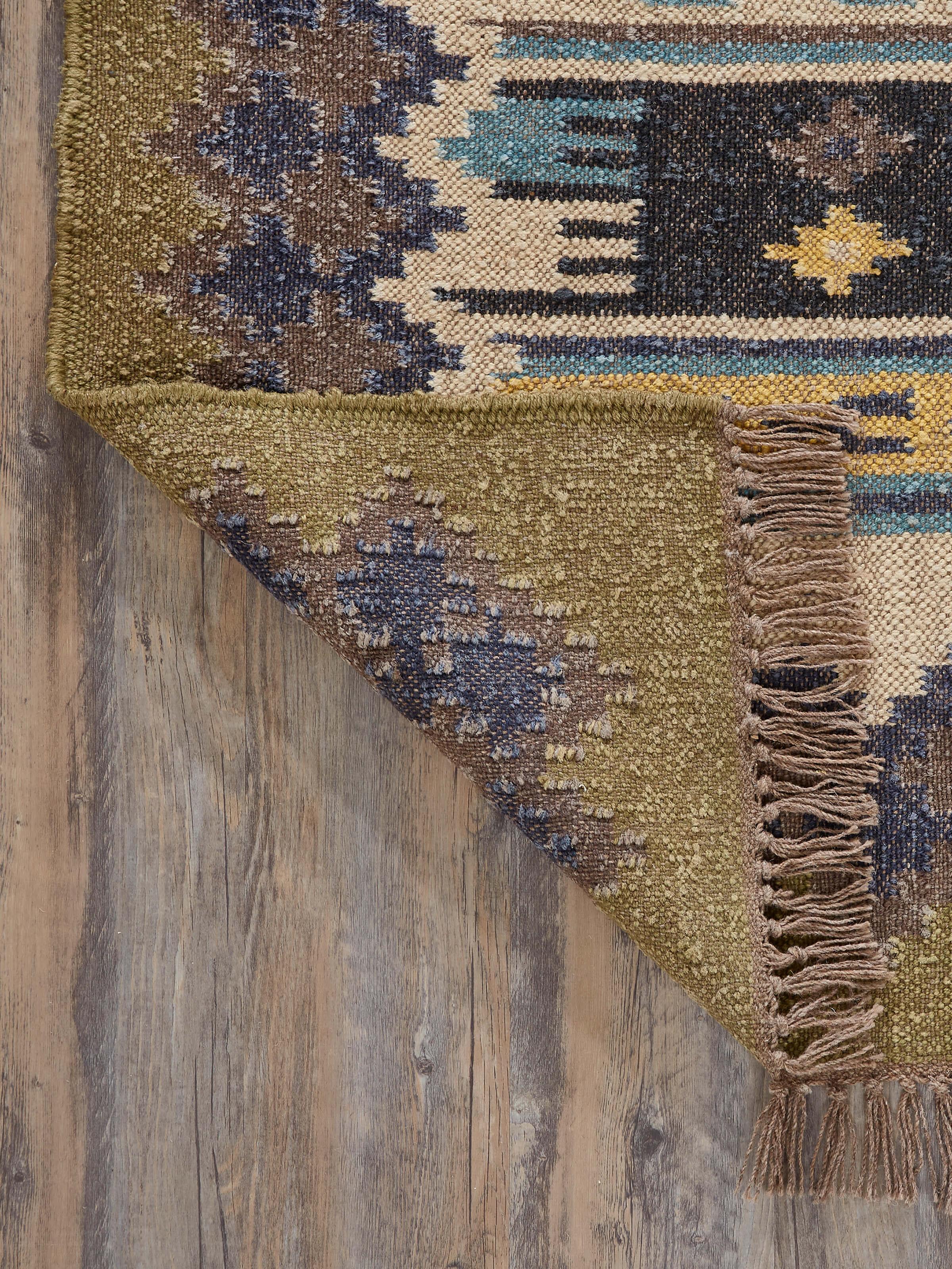 Front view of Traditional Kilim green blue lawan jute & wool panja dhurrie, showcasing the vibrant colors and traditional design.