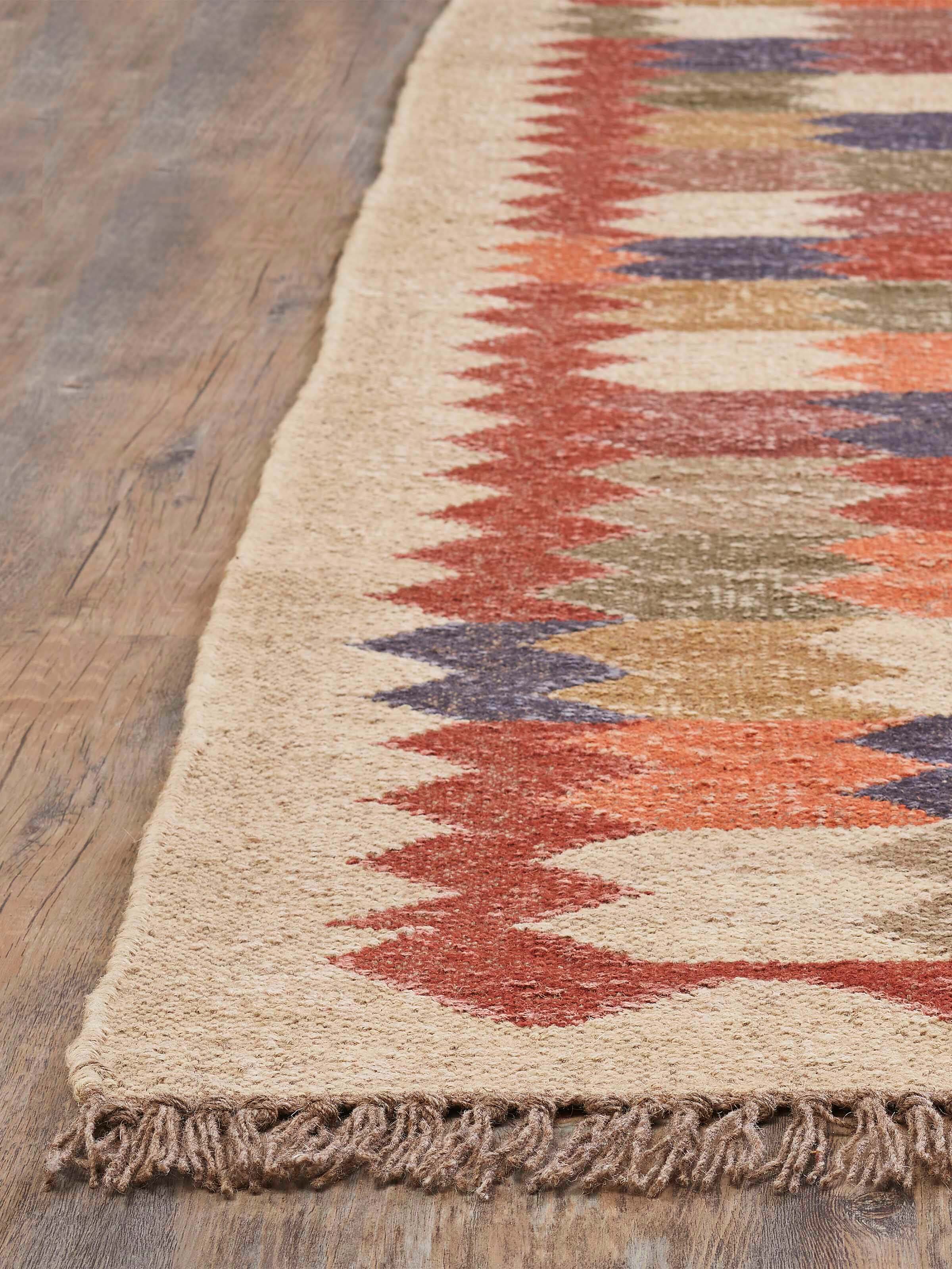 Detailed view of Geo Chevrons Jute & Wool Panja Dhurrie, focusing on the geometric design and high-quality jute-wool composition.