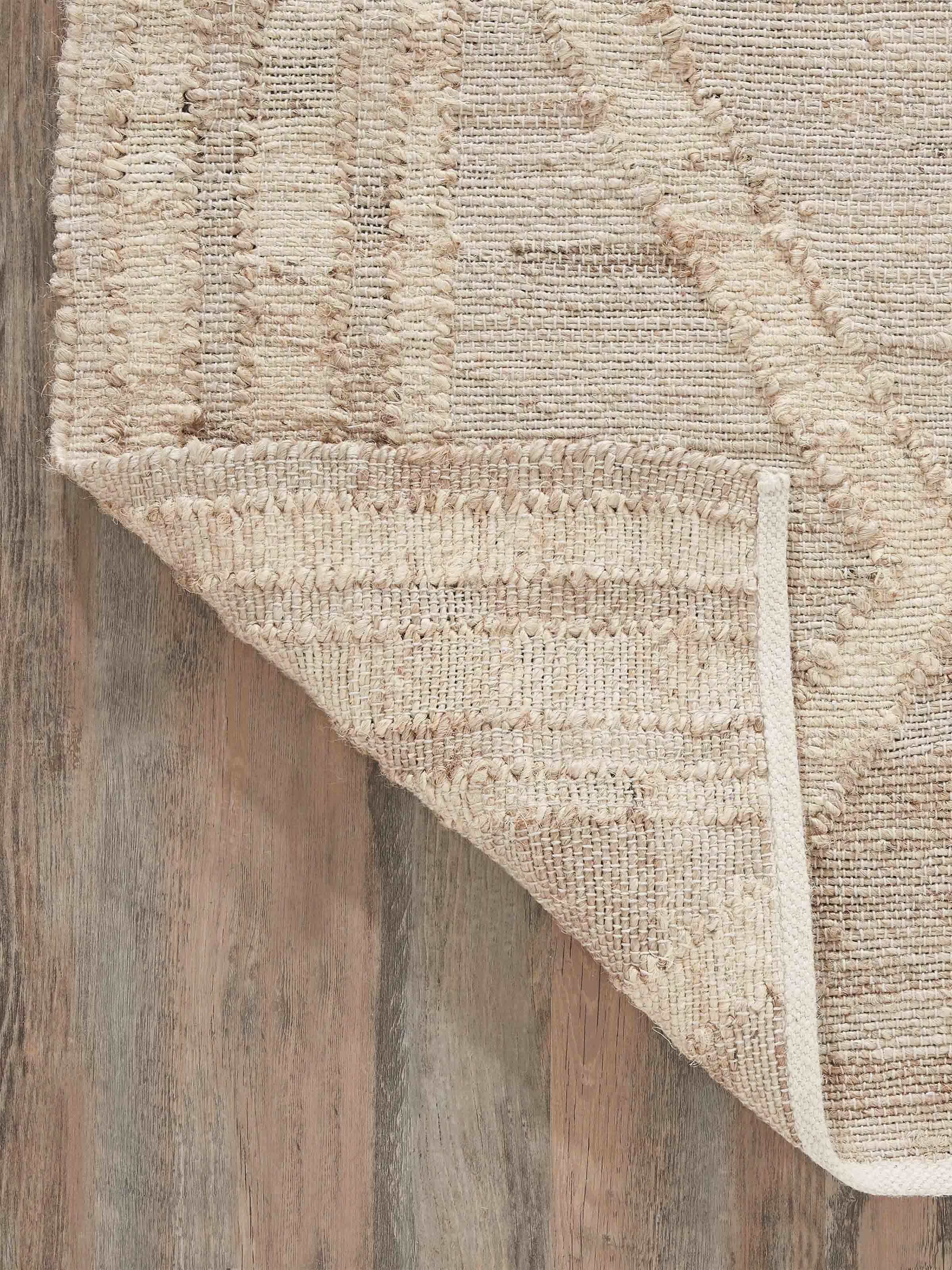 Full view of Contemporary geo beige jute & cotton natural fibre rug (5x8 ft) showing its modern design and color.