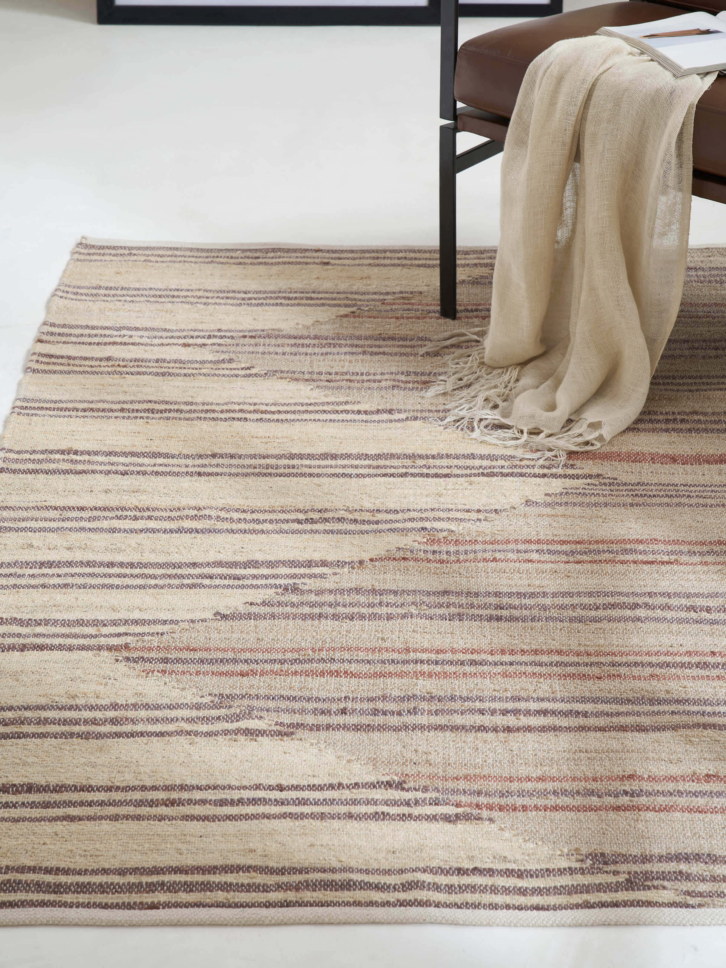 Close-up of Geo Stripes beige brown jute & cotton natural fibre rug, showing texture details