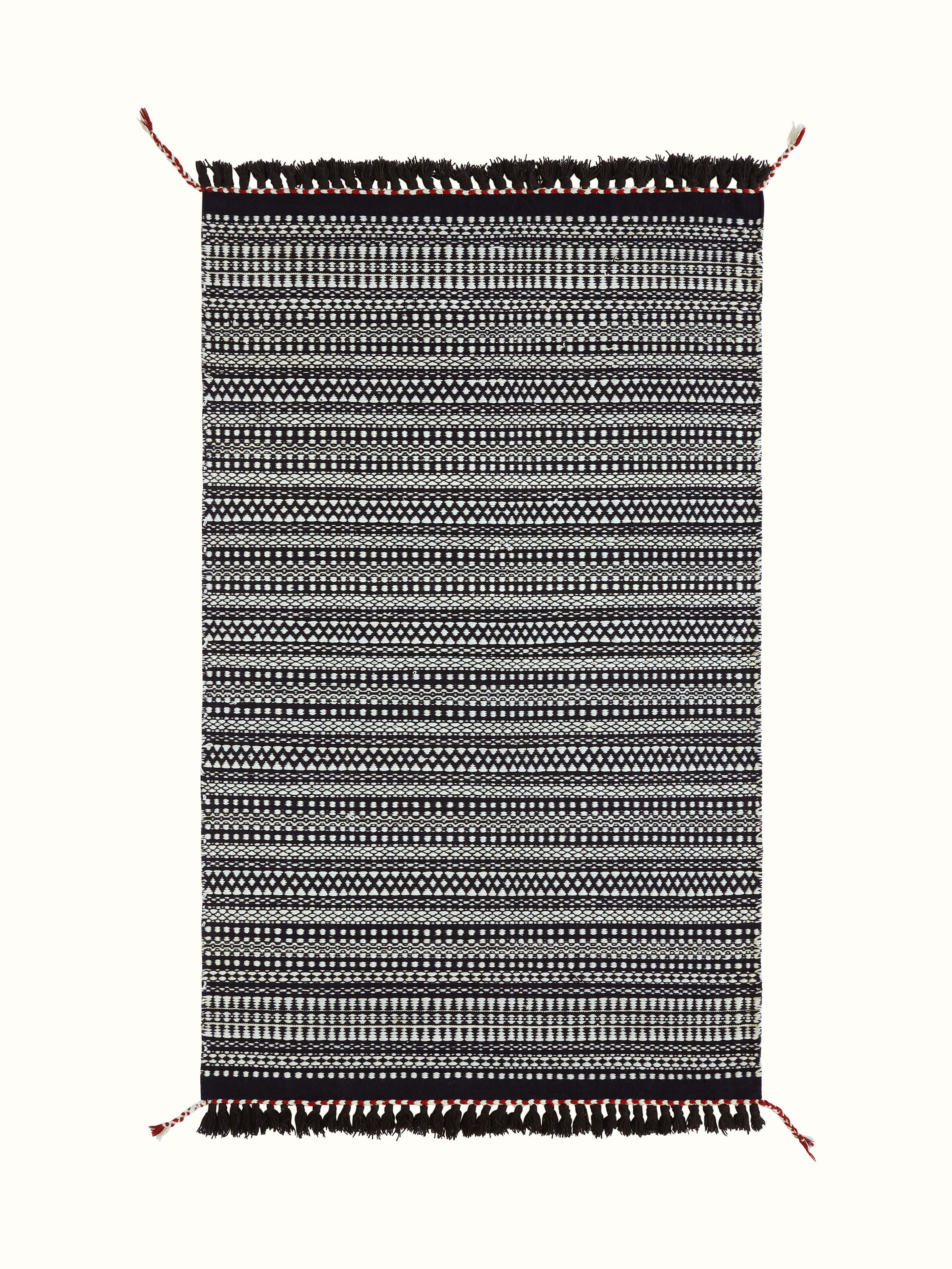 Full view of Sindhi textured ivory black salawas wool panja dhurrie, highlighting the elegant design and color contrast.