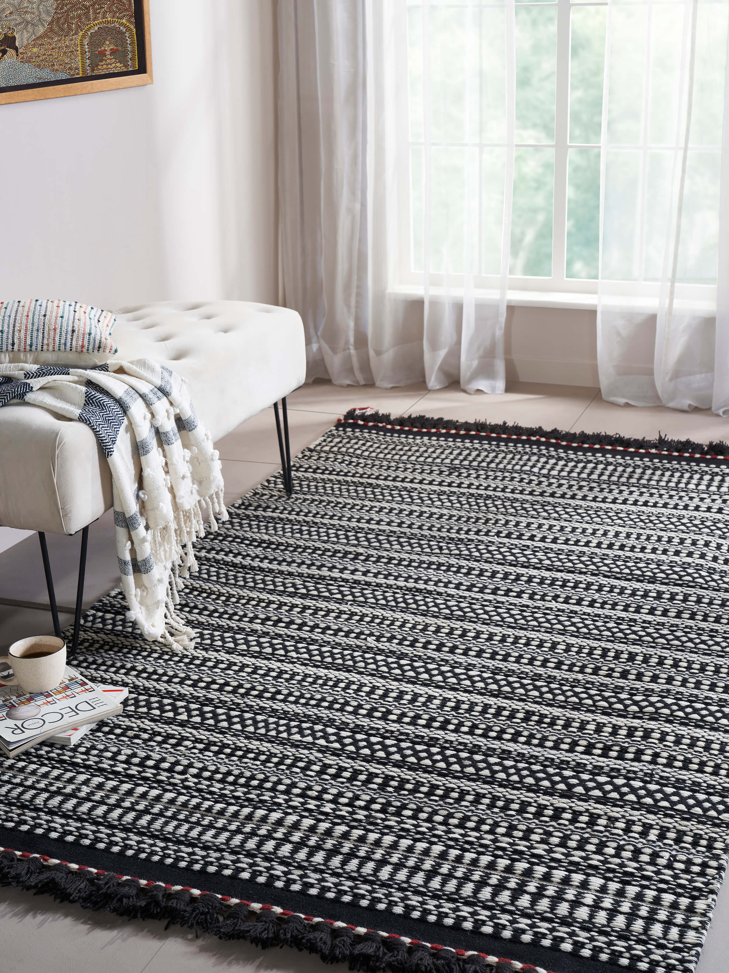 Close-up of Sindhi textured ivory black salawas wool panja dhurrie, showcasing the detailed texture and intricate pattern.