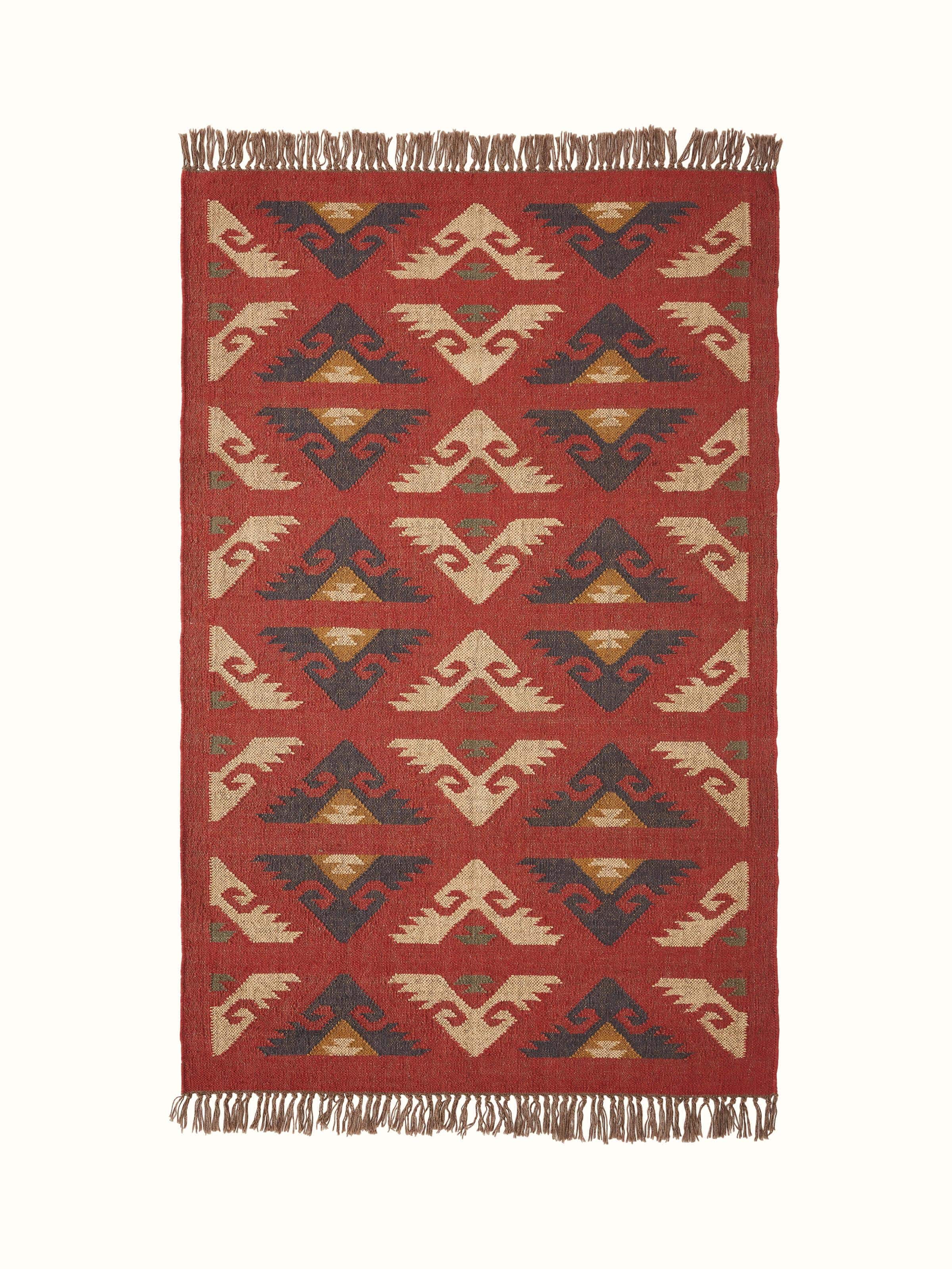 Front view of Traditional kilim red lawan wool & jute panja dhurrie showing the red and jute pattern