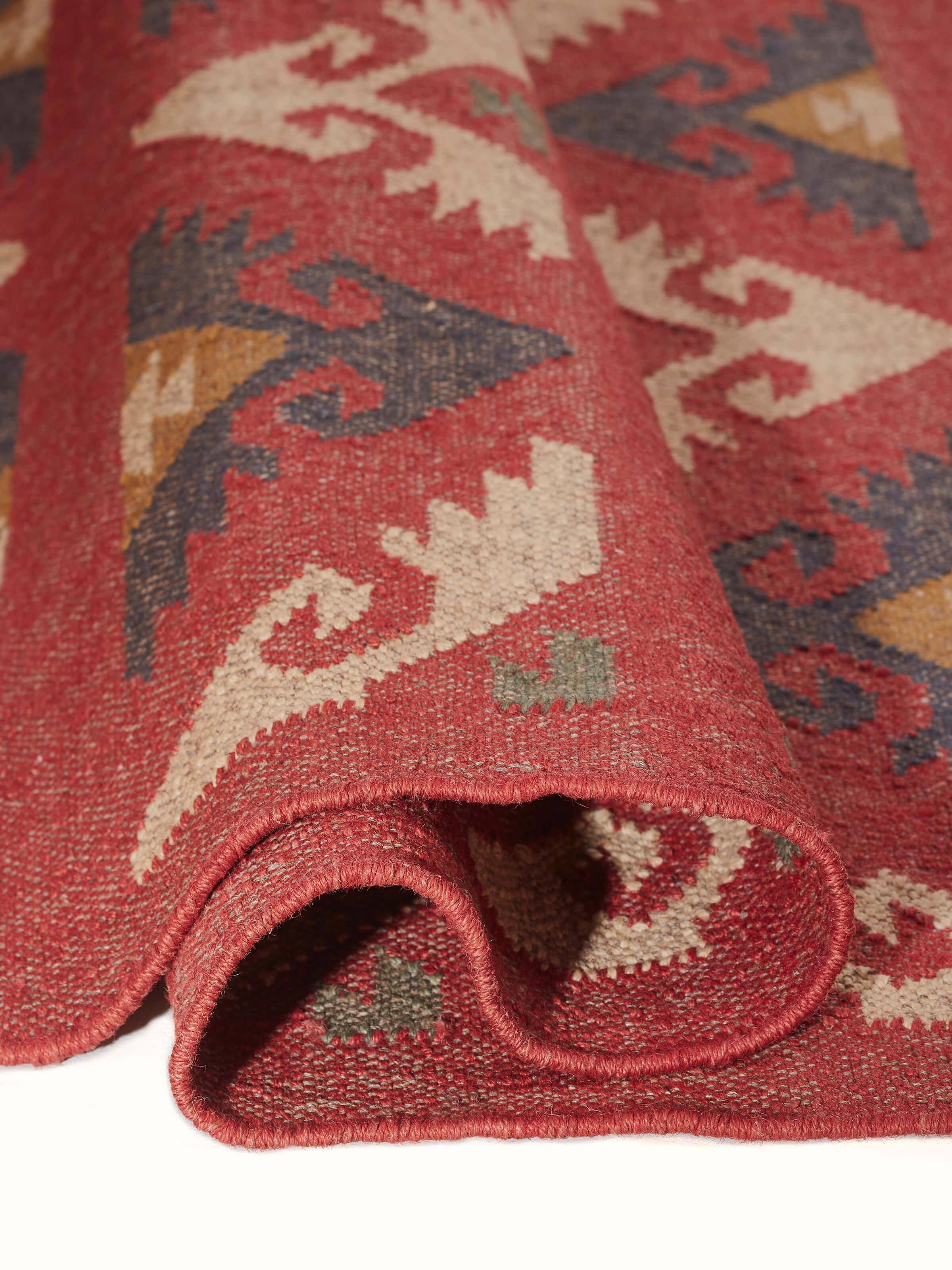 Back view of Traditional kilim red lawan wool & jute panja dhurrie focusing on its construction and material