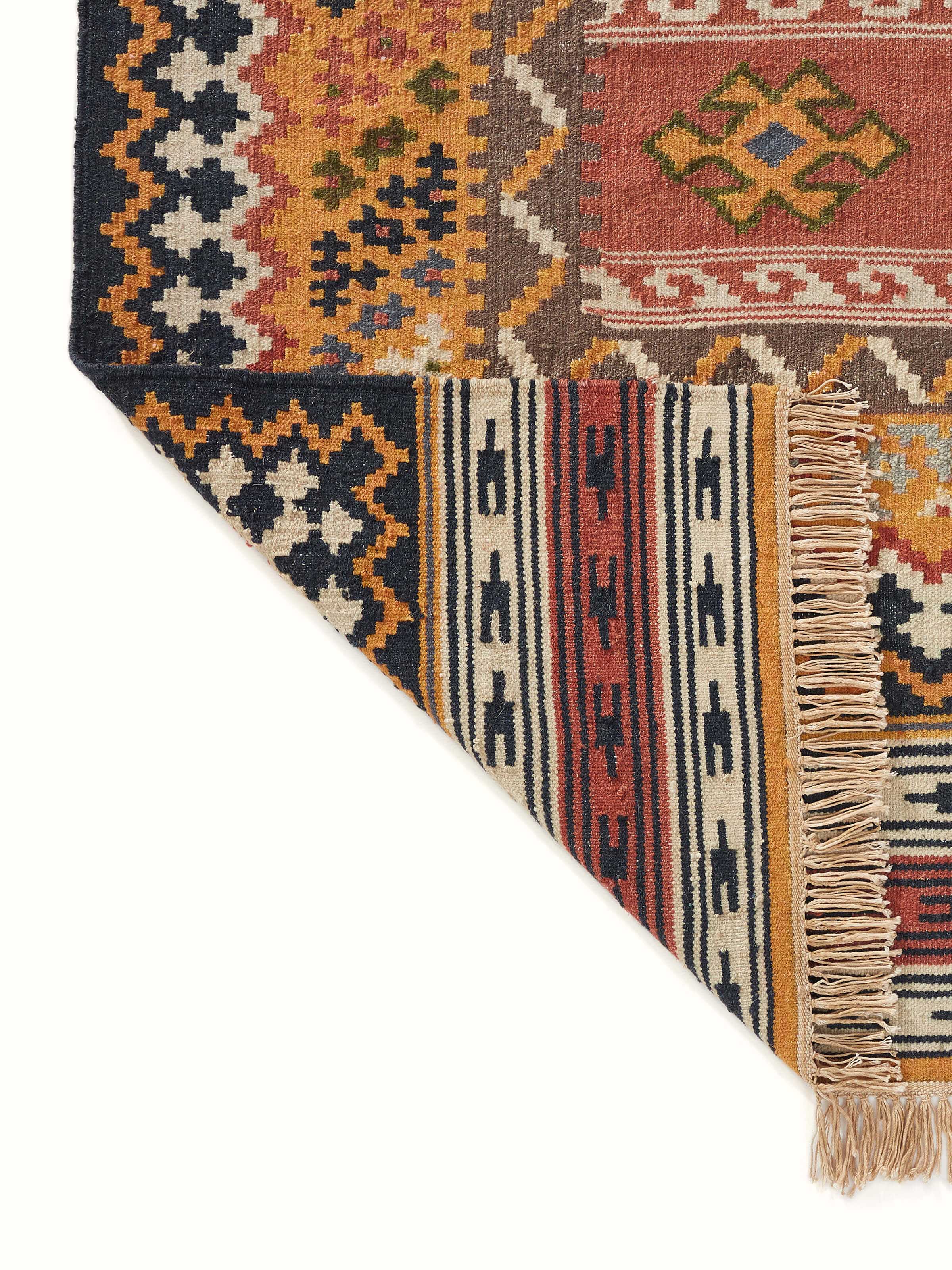 Traditional Kilim Salawas wool & cotton Panja dhurrie styled in a room setting to illustrate its scale and style