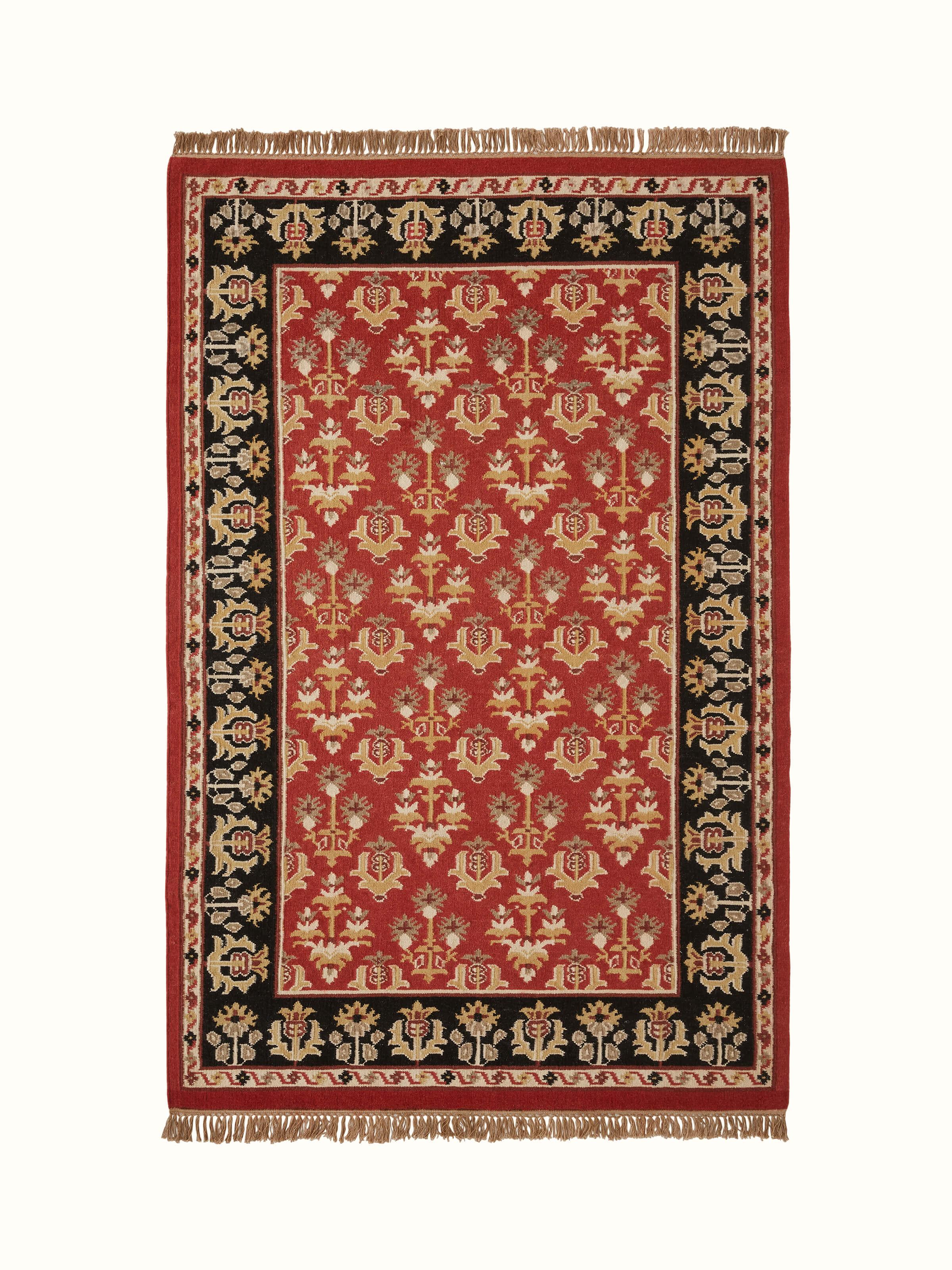 Full view of Traditional floral kilim rust salawas wool & cotton panja dhurrie showcasing its vibrant floral patterns and rich colors
