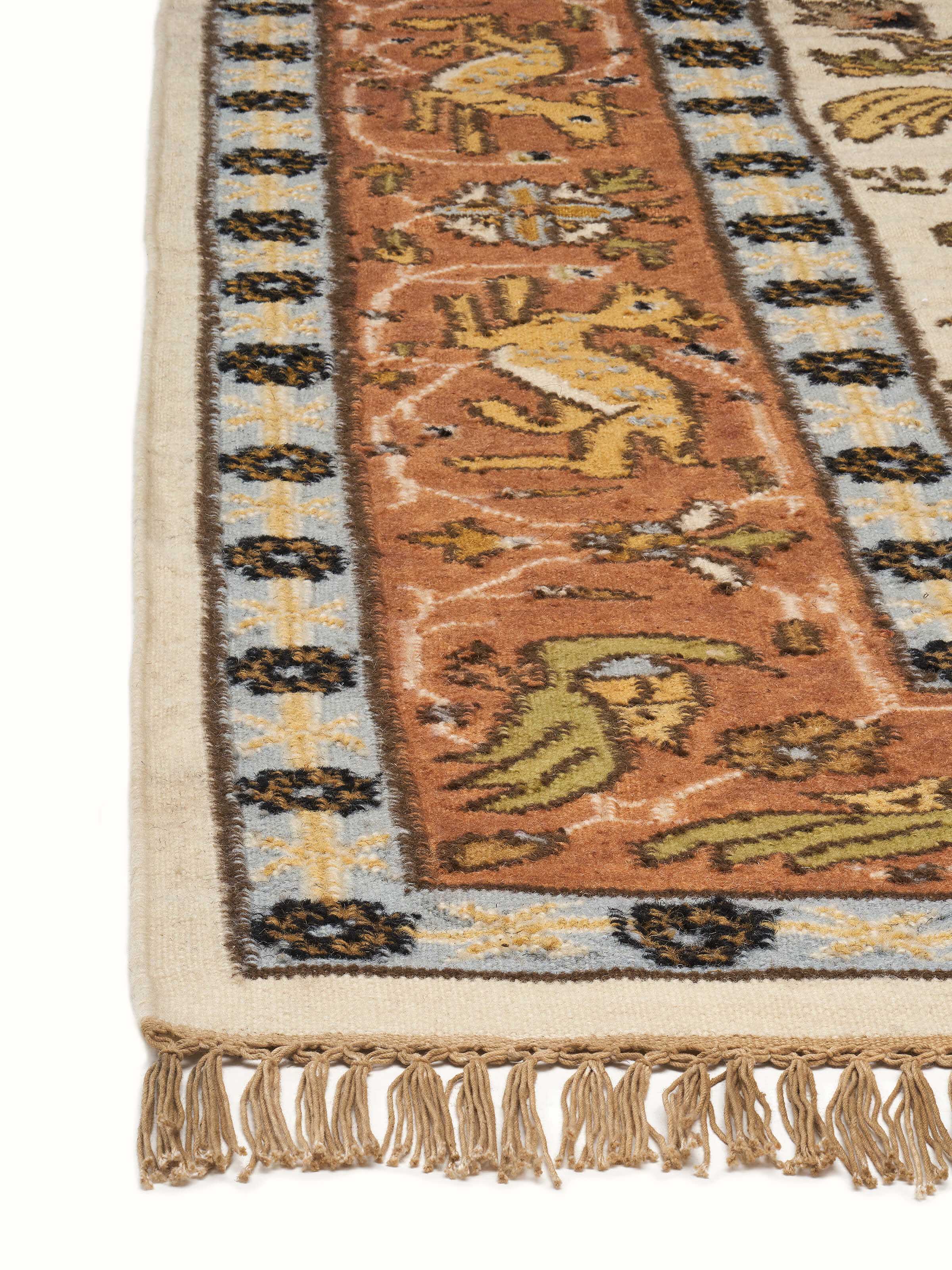 Detailed close-up of Kilim hunting salawas wool & cotton panja dhurrie, showcasing the weaving and intricate patterns.