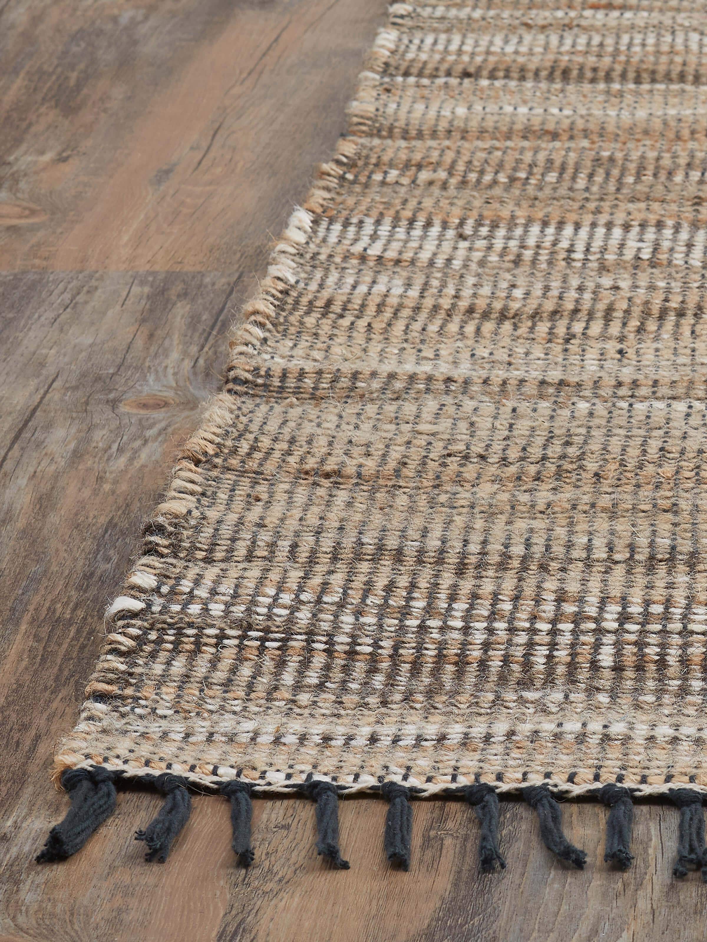 Detailed view of Textured Beige Charcoal Lawan Jute & Cotton Natural Fibre Rug, emphasizing the texture and weave pattern.