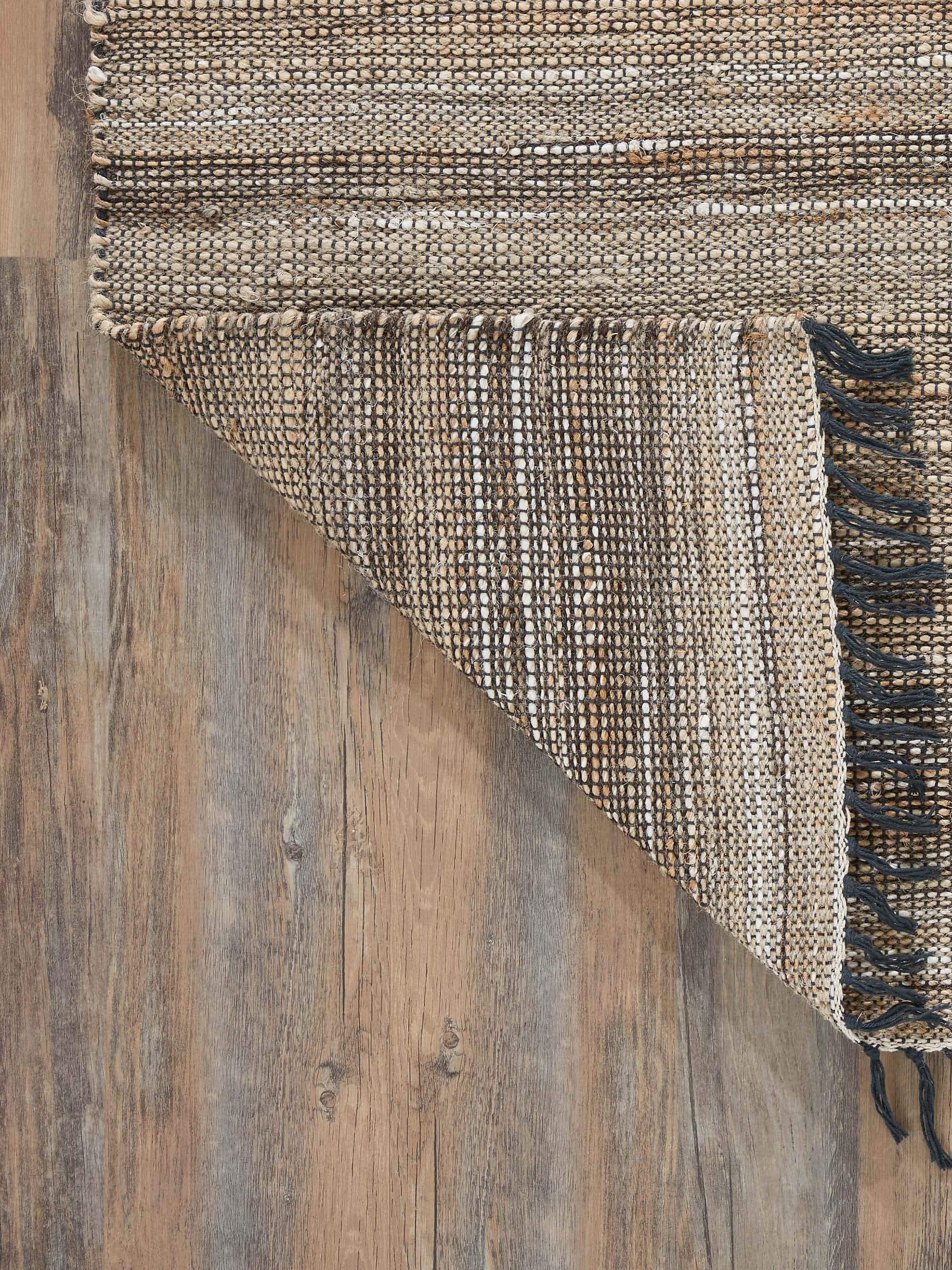 Close-up of the Textured Beige Charcoal Lawan Jute & Cotton Natural Fibre Rug, focusing on the detailed texture and color blend.