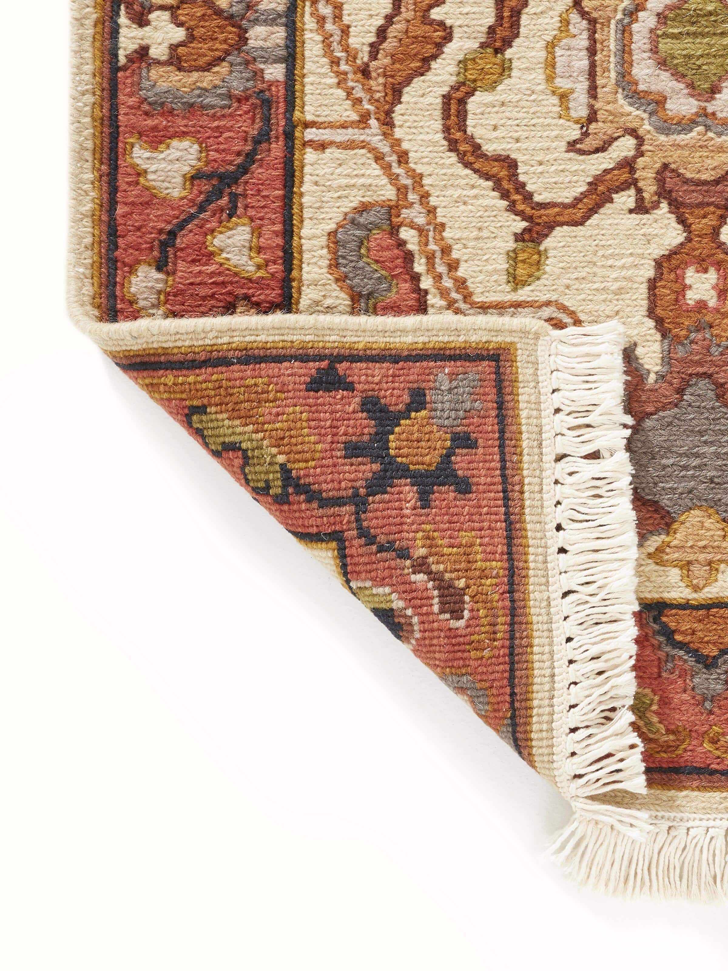 Oushak traditional off-white Bhadohi wool hand-knotted runner rug, detailed view of texture.