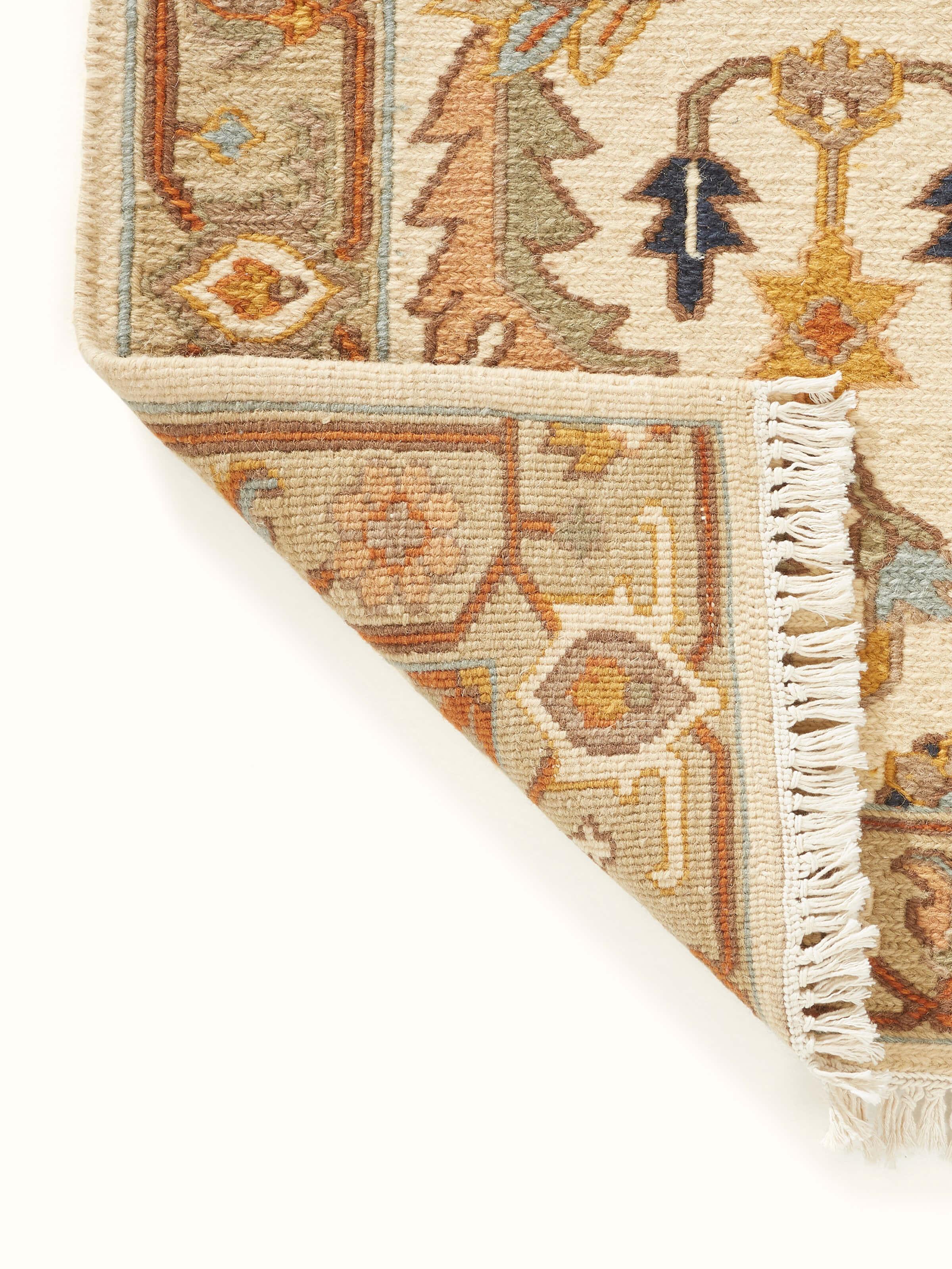 Top view of Nomad traditional off-white Bhadohi wool hand-knotted runner highlighting its elegant off-white color and design.