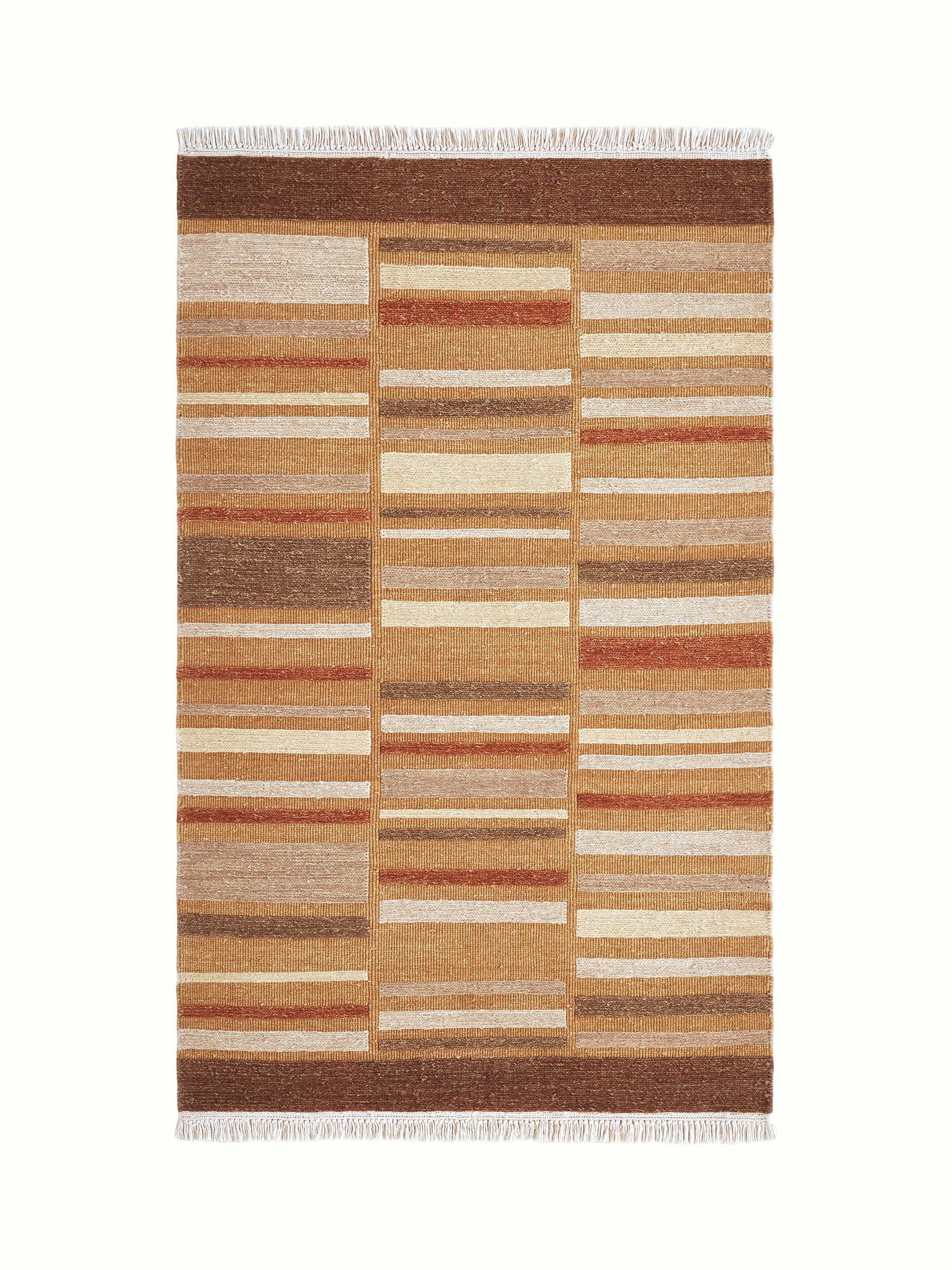 Full view of Geo solid textured sumak rust Bhadohi wool hand-knotted rug displaying the rich rust color and textured design.
