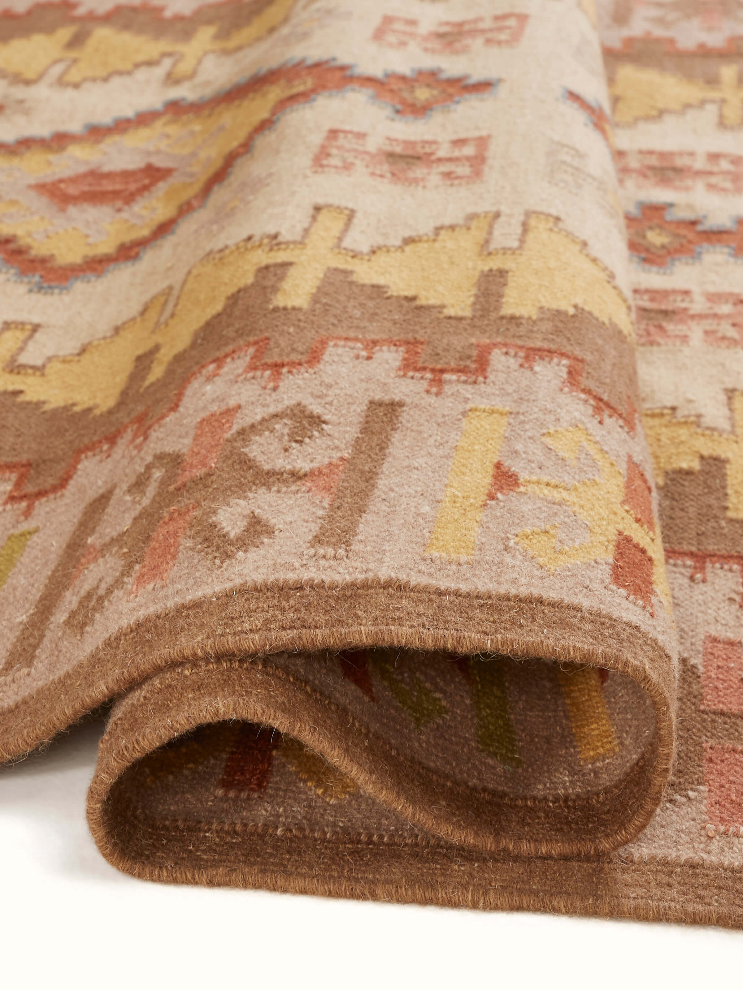 Folded view of Traditional Kilim wool panja dhurrie highlighting the overall design and craftsmanship.