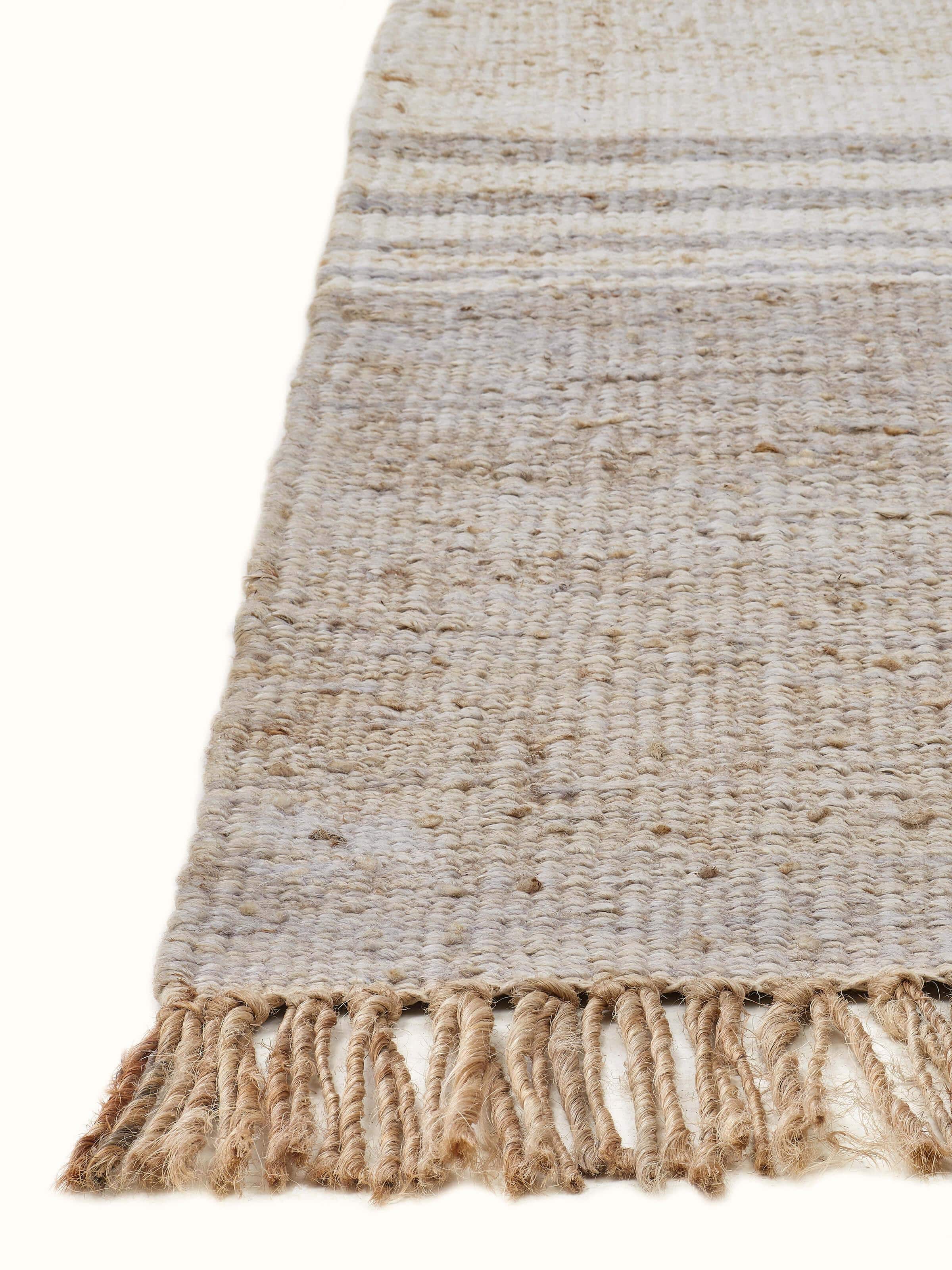 Detailed close-up of Graphic geo beige grey jute natural fibre rug showing the natural fibre texture