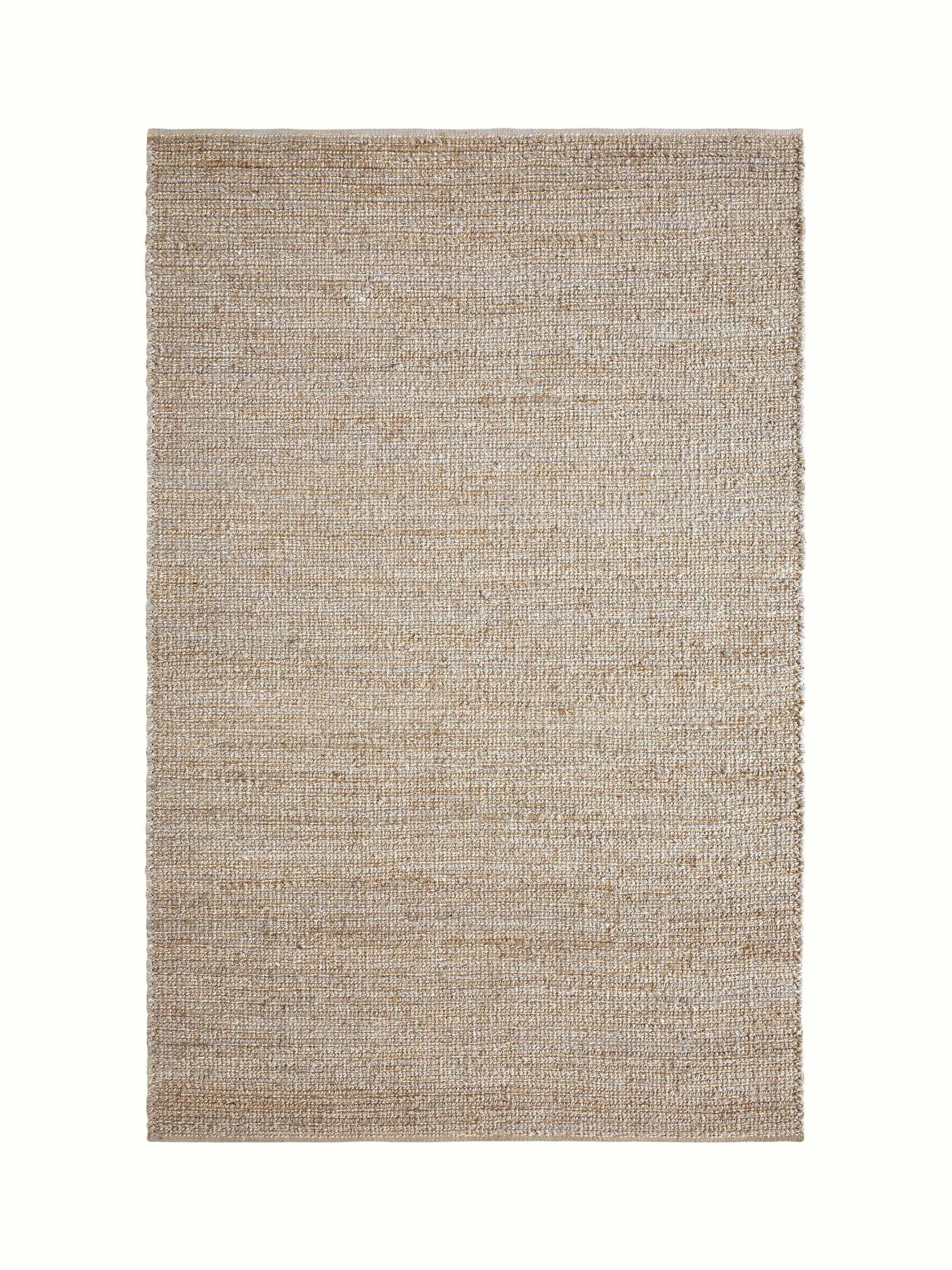 Textured solid grey jute and wool natural fibre rug (5x8 ft) showcasing a close-up of its intricate texture and grey tones.