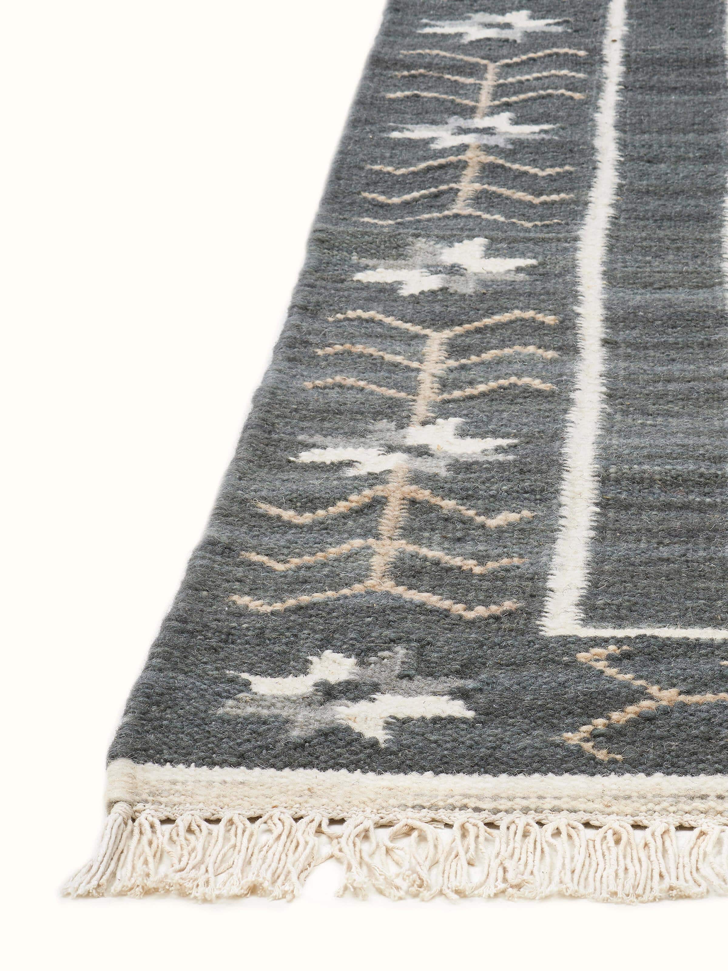 Detailed view of Contemporary geo grey wool panja dhurrie focusing on the intricate geometric patterns.