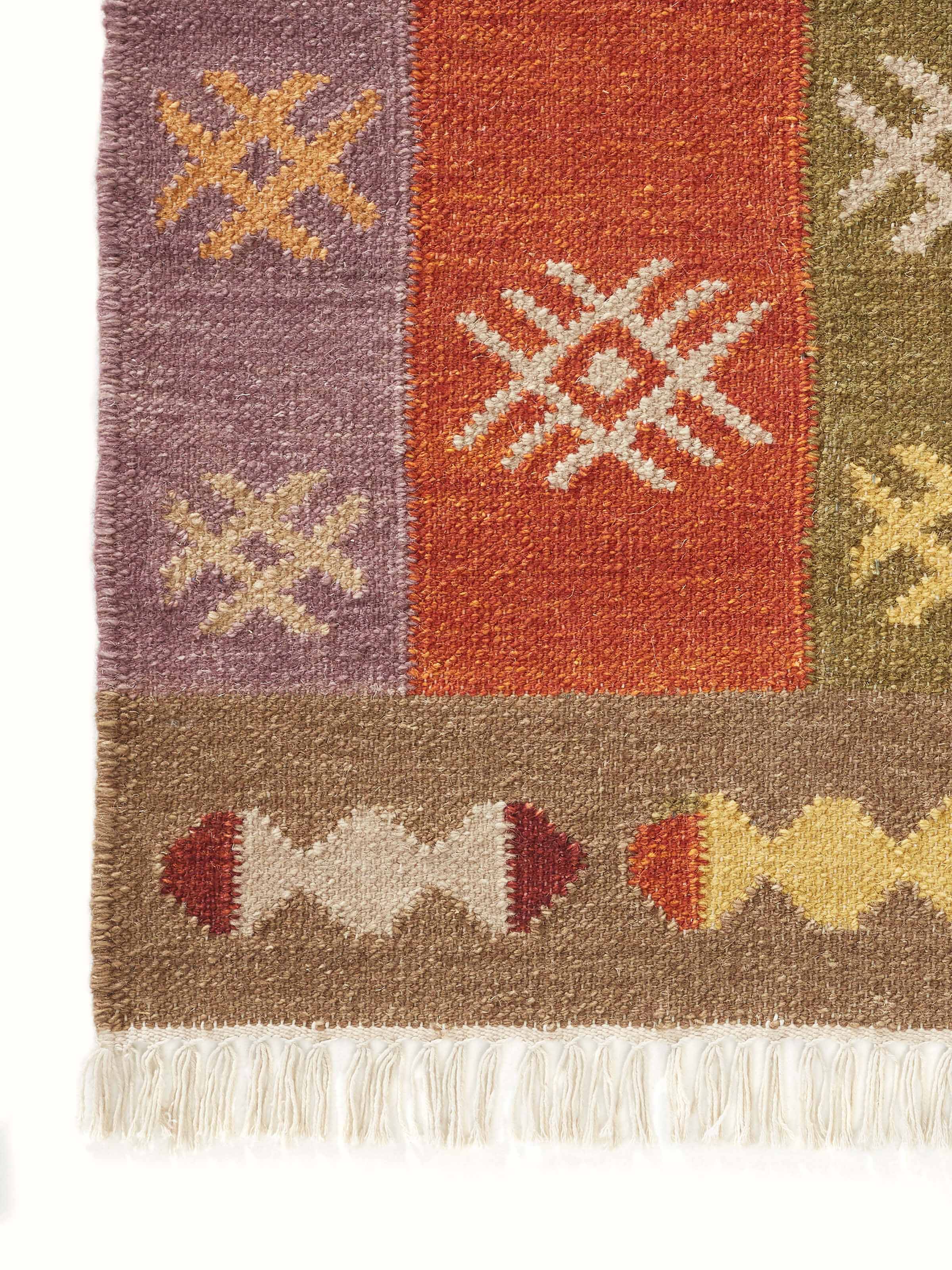 Detailed shot of Kilim Patchwork Orange Wool Panja Dhurrie, emphasizing the unique patchwork design and color patterns.