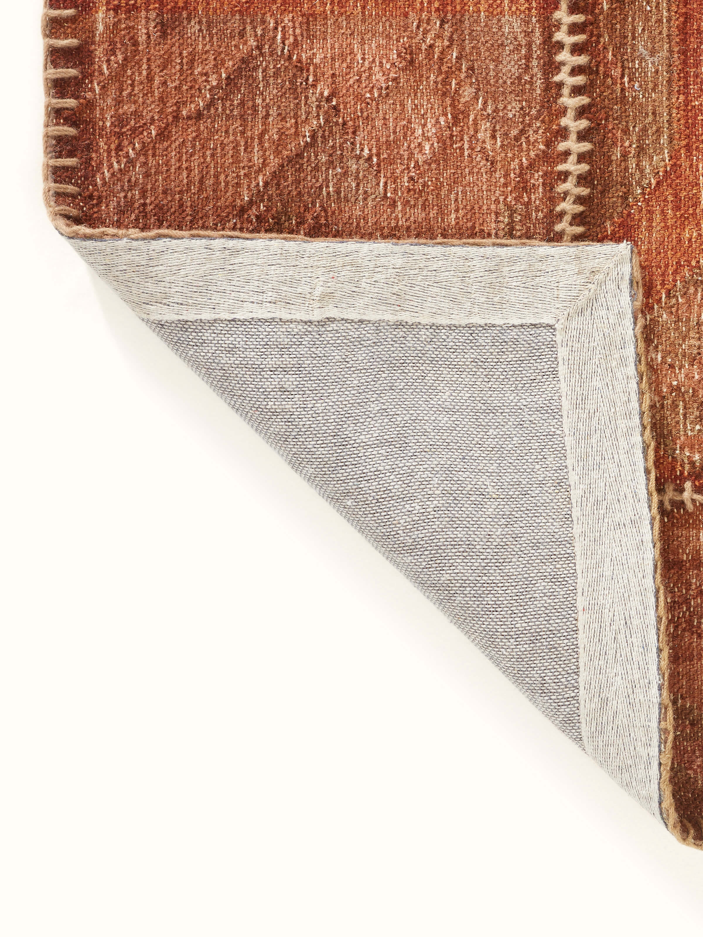 Kilim patchwork antique red wool panja dhurrie with a view of the border details and design elements