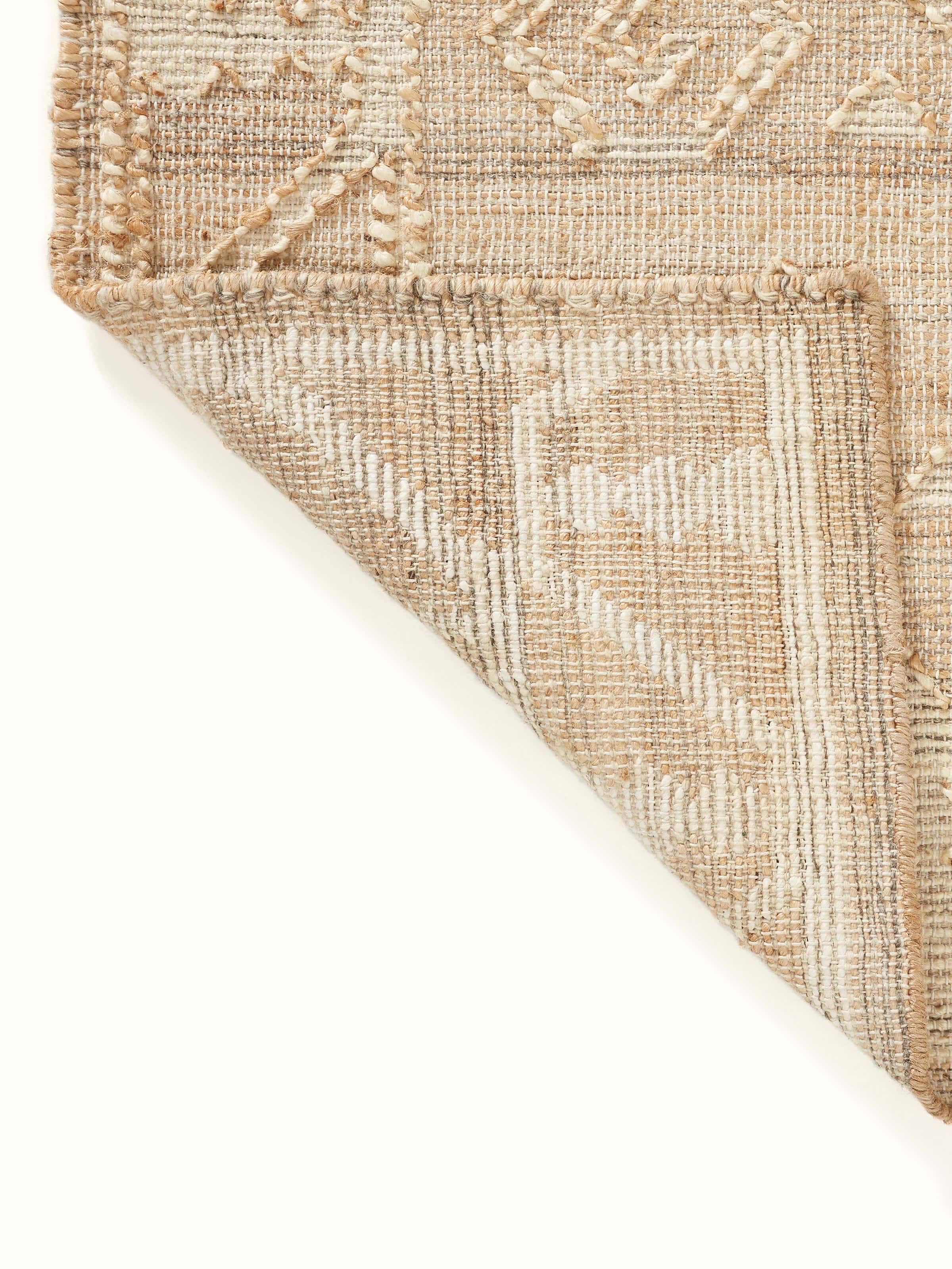 Detailed view of Traditional Kilim Beige Jute Natural Fibre Rug showing the texture and design details.
