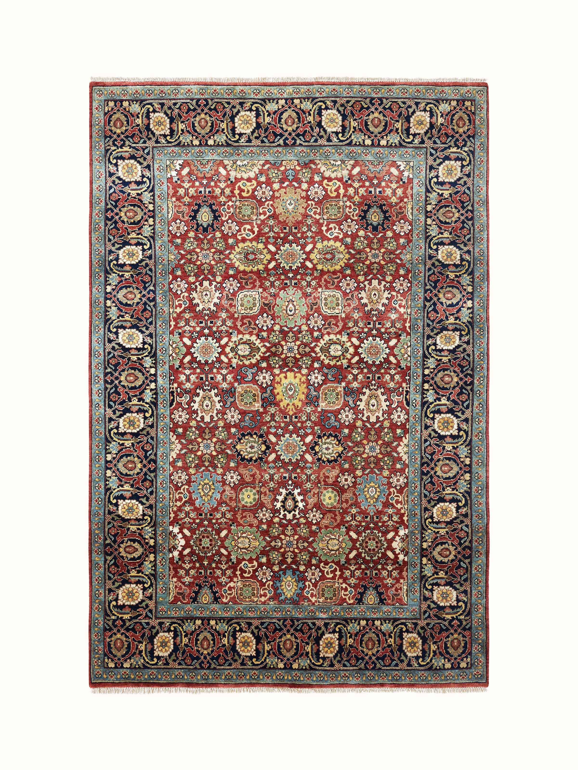 Traditional mahal red Bhadohi wool hand-knotted rug, showing the rich red color and intricate patterns