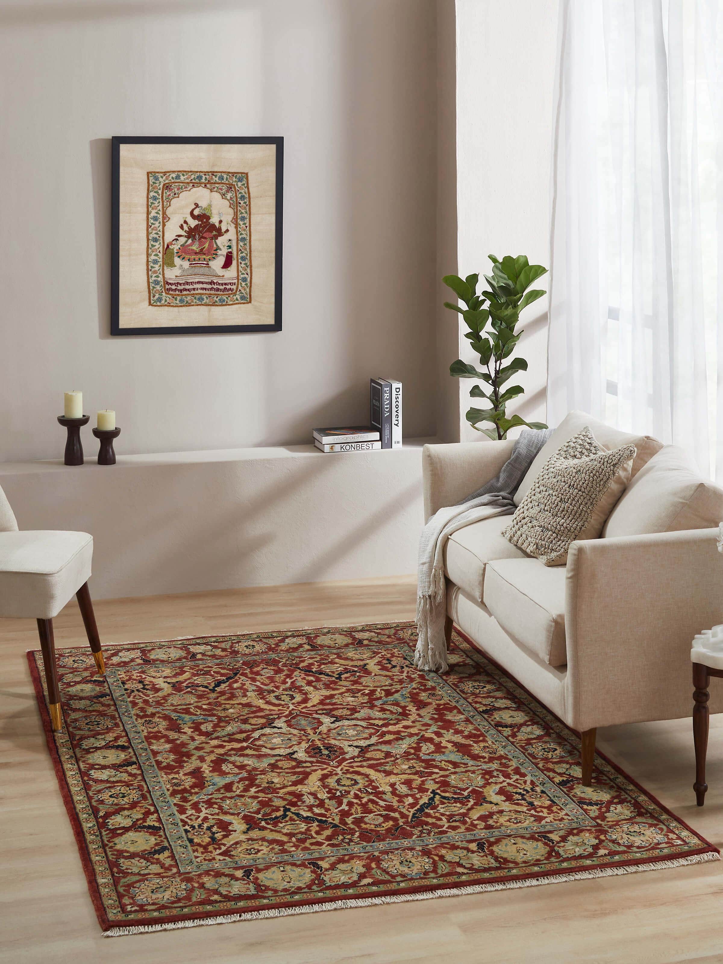 Close-up of Traditional Polonise rust Bhadohi wool hand-knotted rug showing detailed patterns and texture.