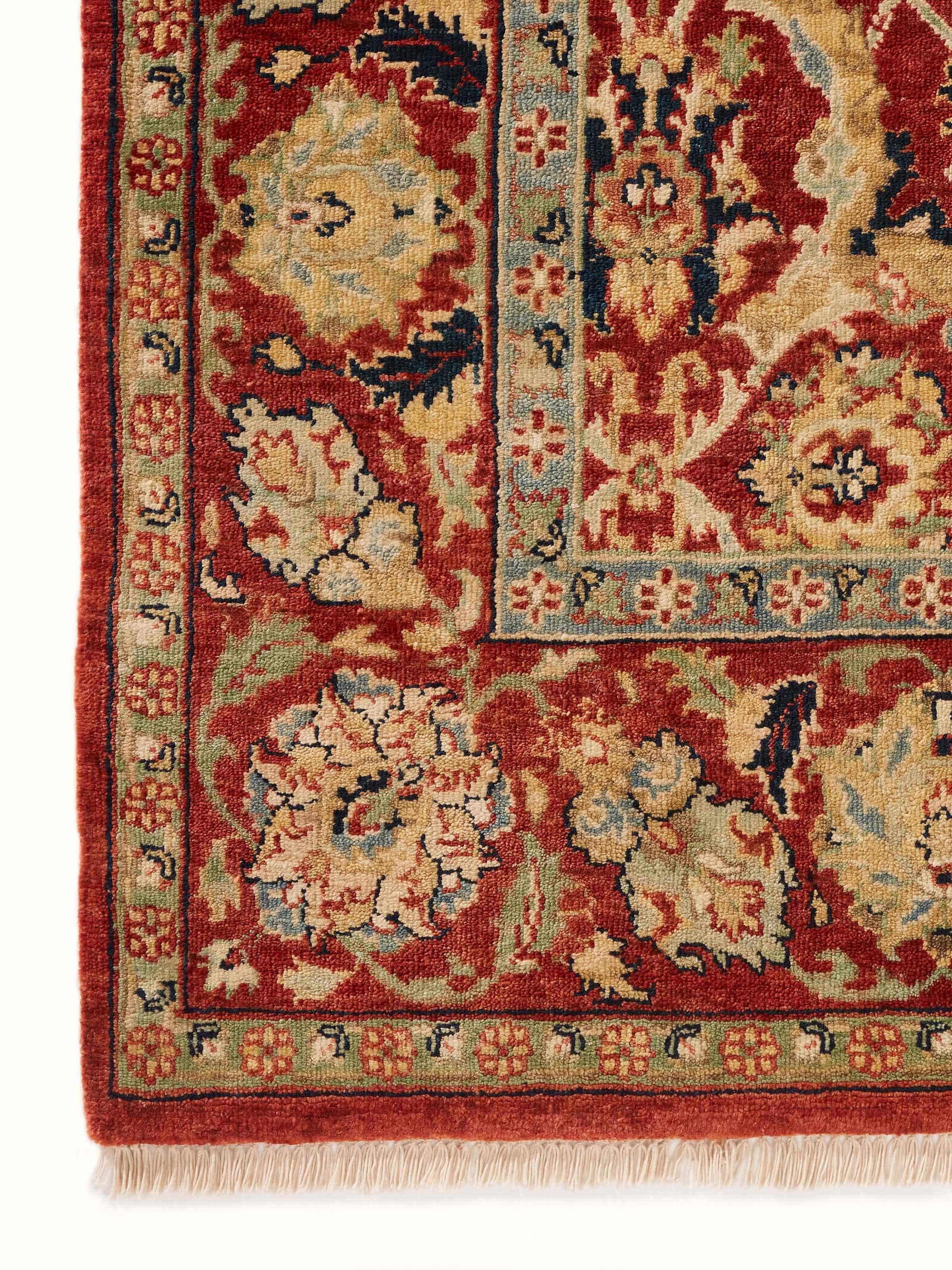 Front view of Traditional Polonise rust Bhadohi wool hand-knotted rug displaying the overall design and color richness.