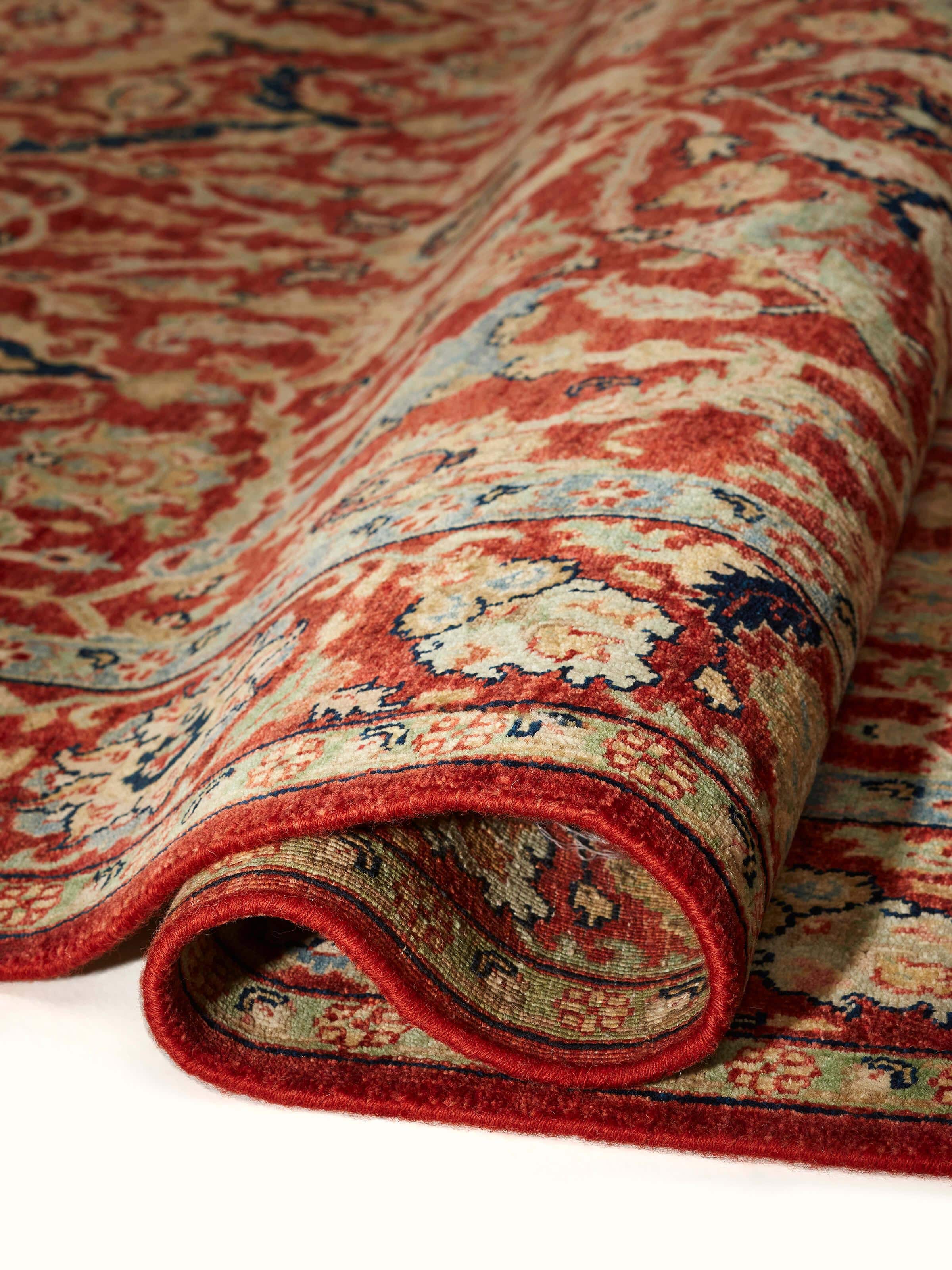 Detailed view of Traditional Polonise rust Bhadohi wool hand-knotted rug focusing on intricate design elements.