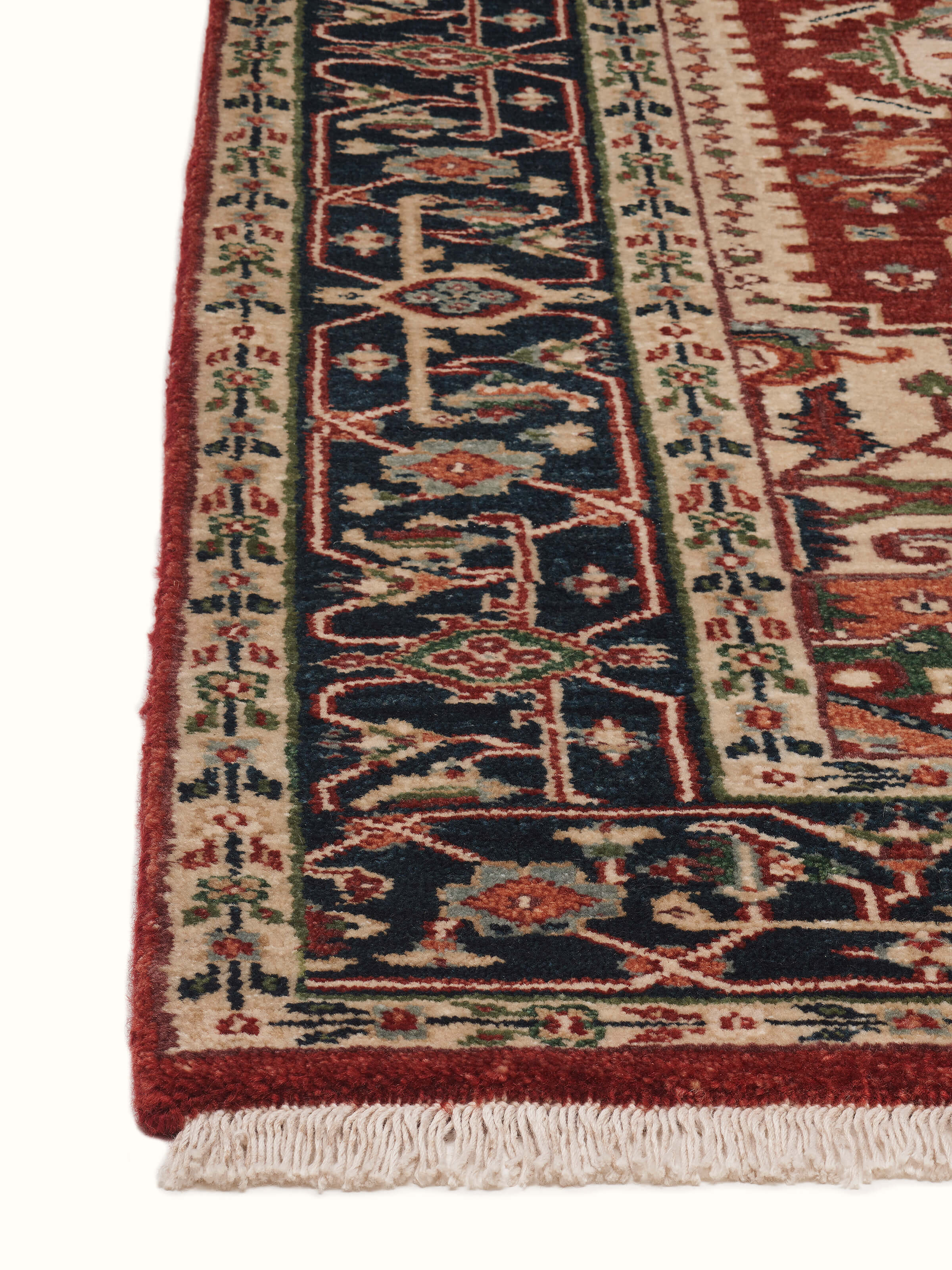 Angled view of Traditional Heriz rust Bhadohi wool hand-knotted rug showing unique design elements