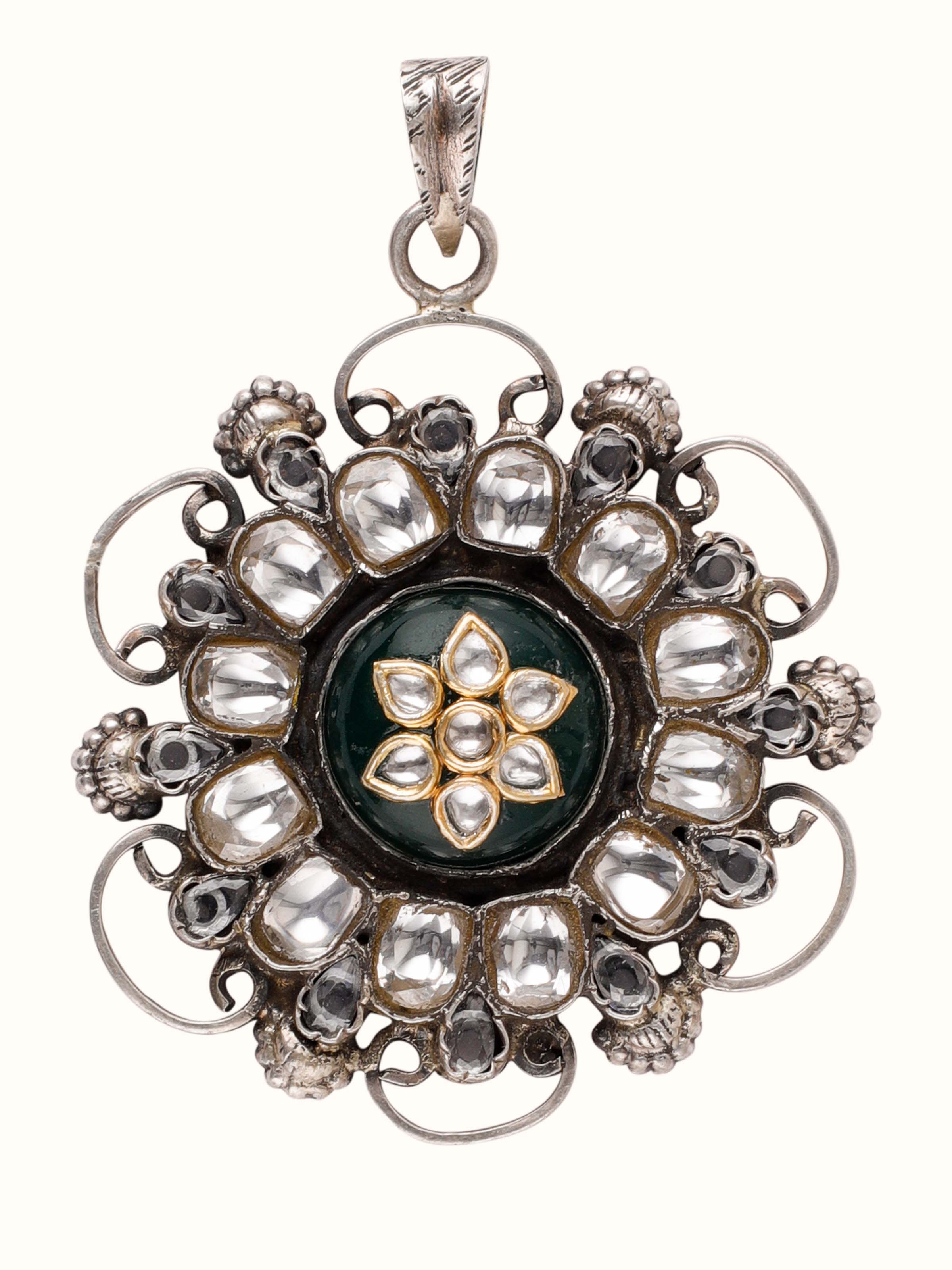 Overhead view of Silver Smithing Pendant showcasing sleek design and refined silver craftsmanship.