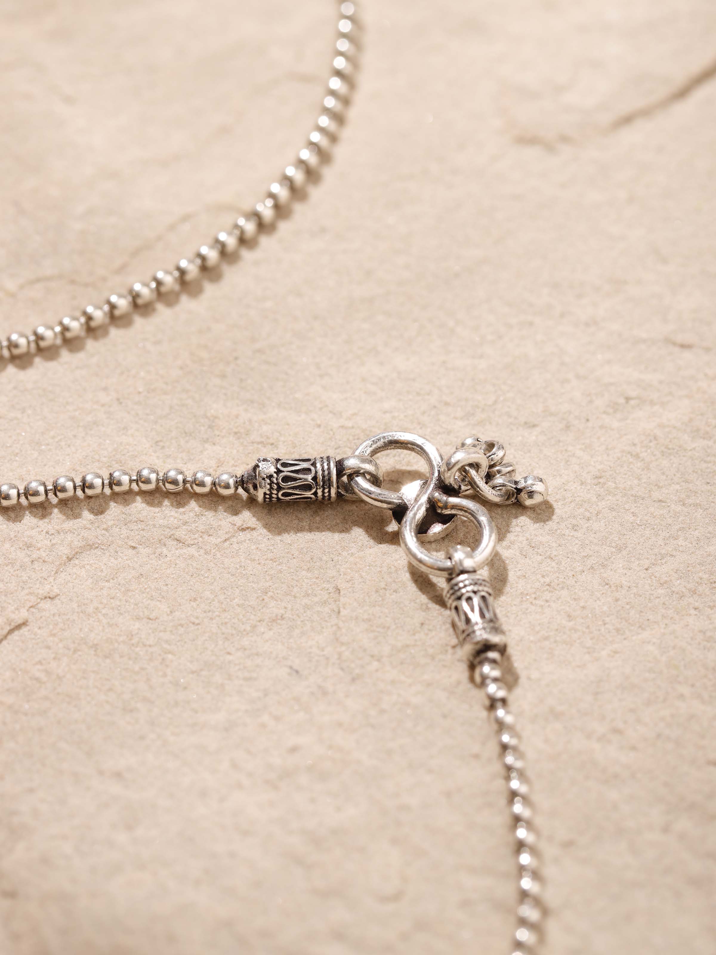 Detailed side view of Silver Smithing Anklets showcasing the refined silverwork and craftsmanship.