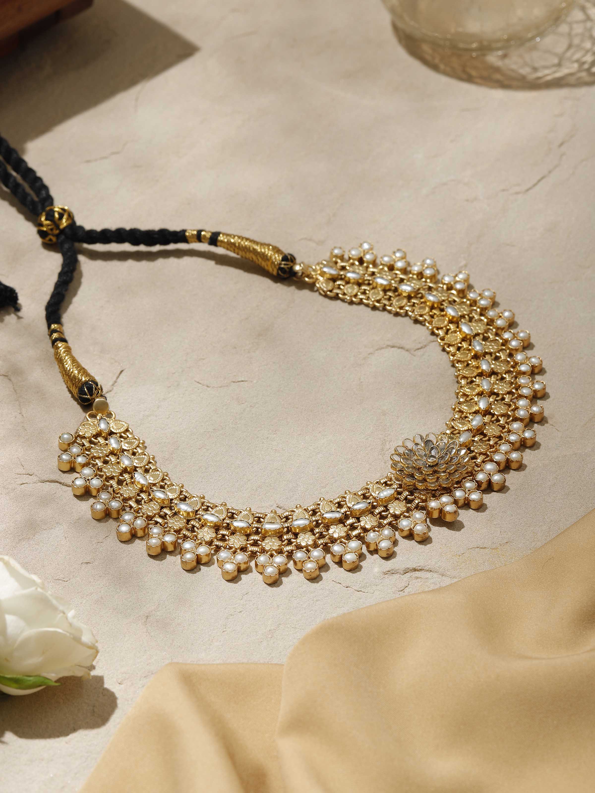 Side view of Silver Smithing Collar Necklace showcasing sleek lines and refined craftsmanship.