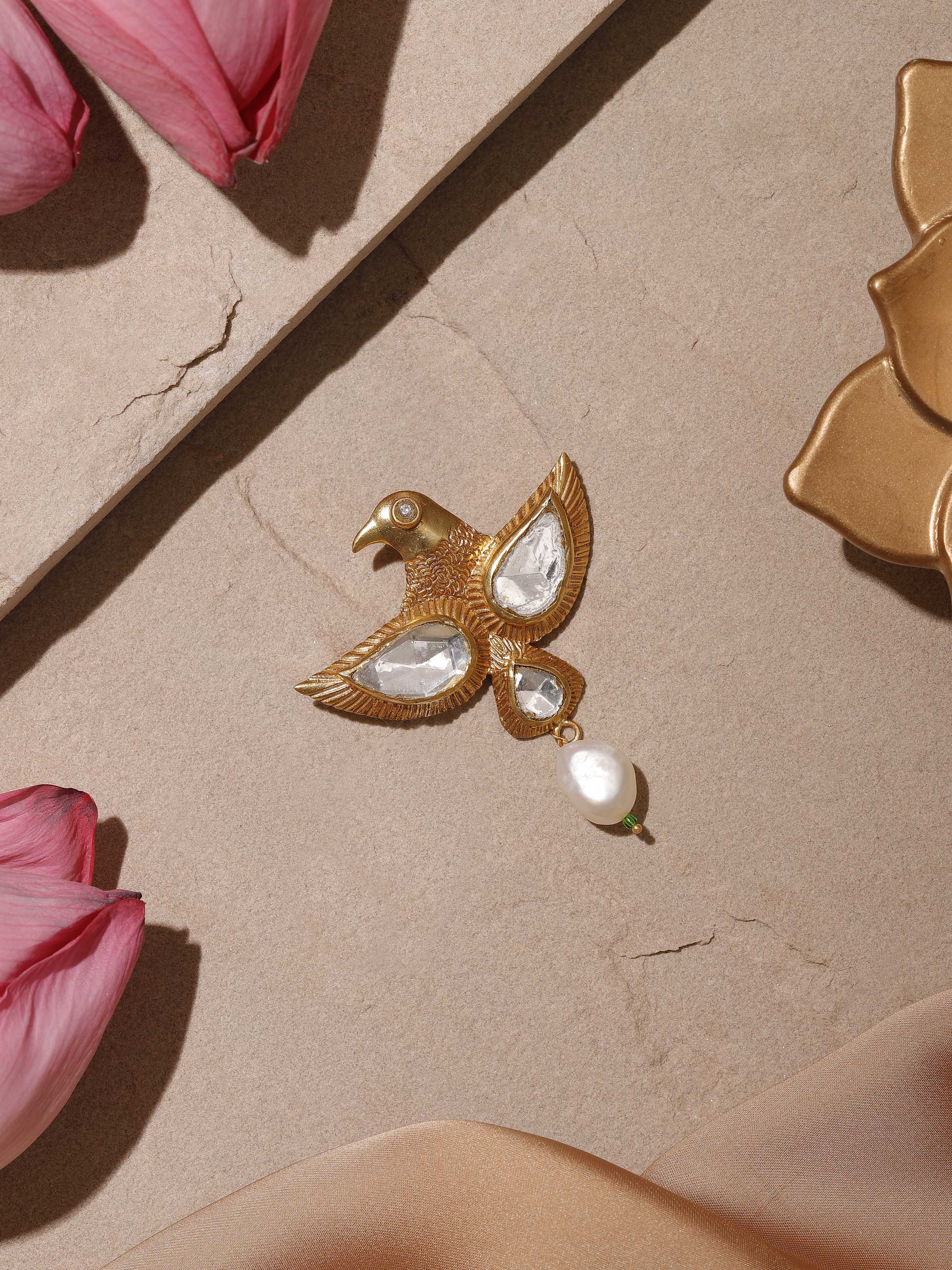 Top view of Silver Smithing brooch pin showing its curved shape and hammered silver texture.