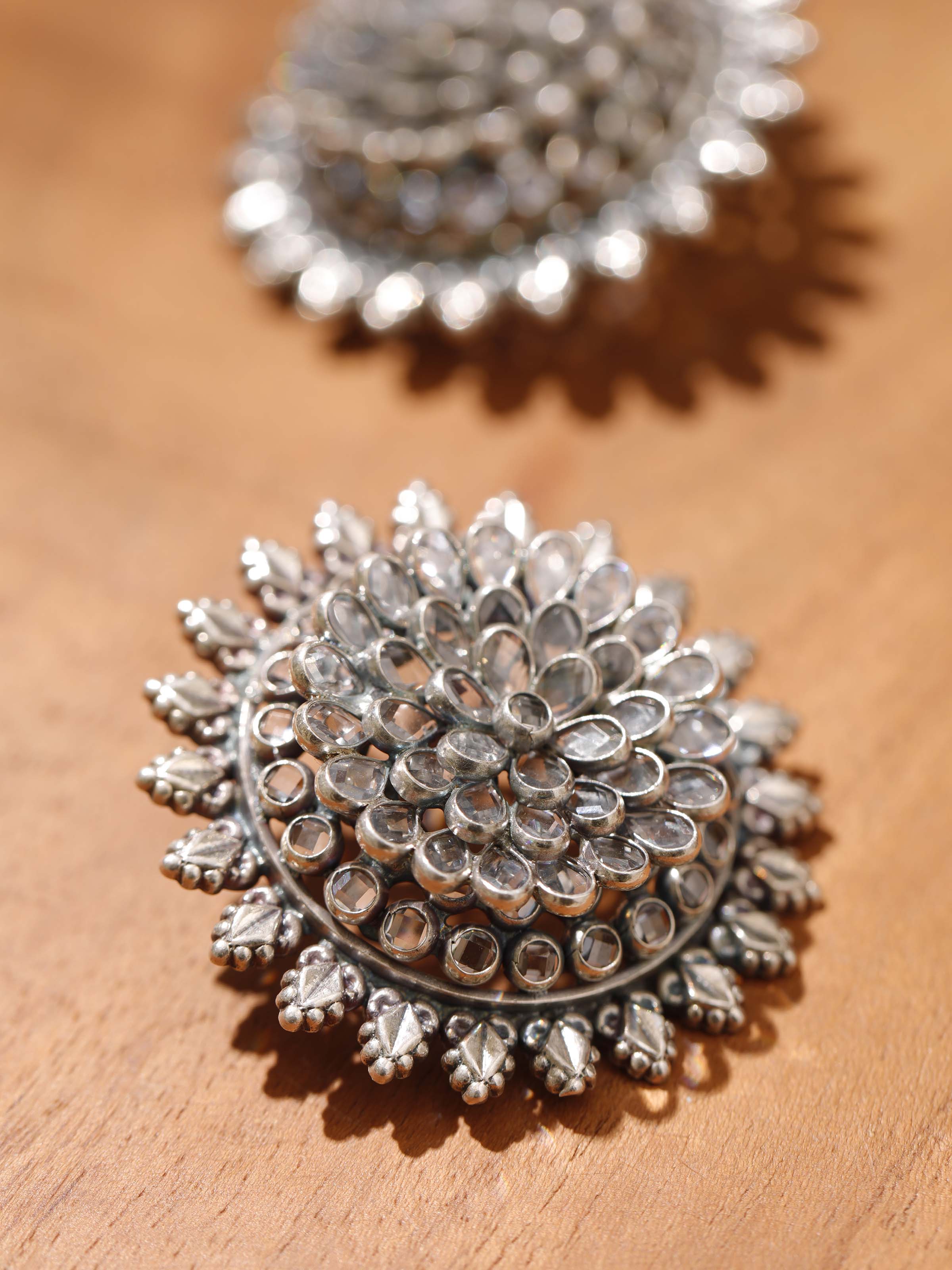 Back view of Smithing Stud Earrings showcasing the post and overall design.