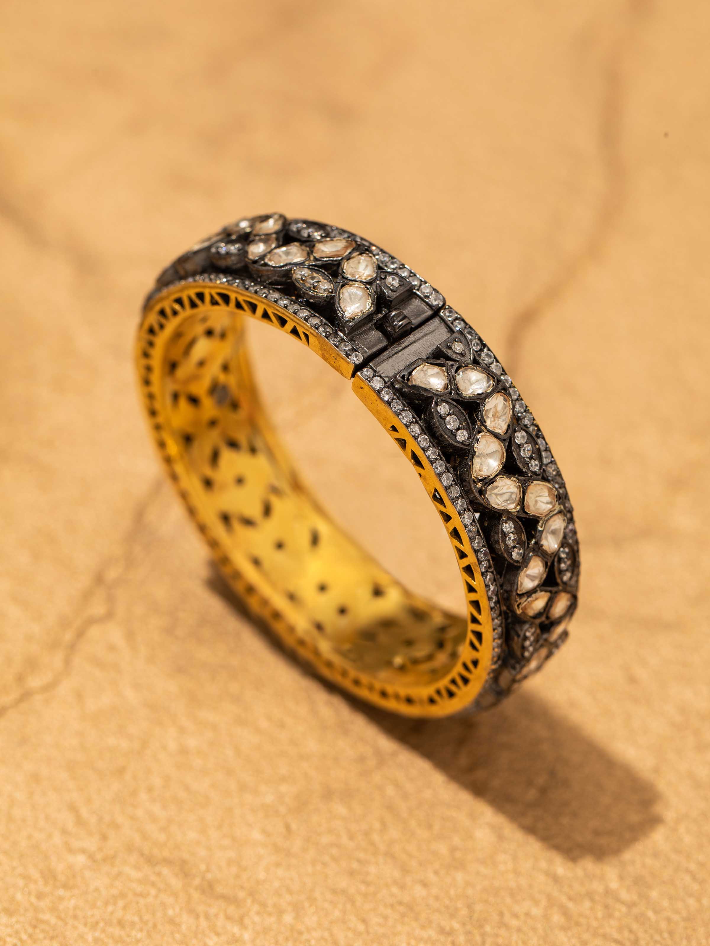 Back view of silversmithing bangle showing the secure clasp and elegant design.