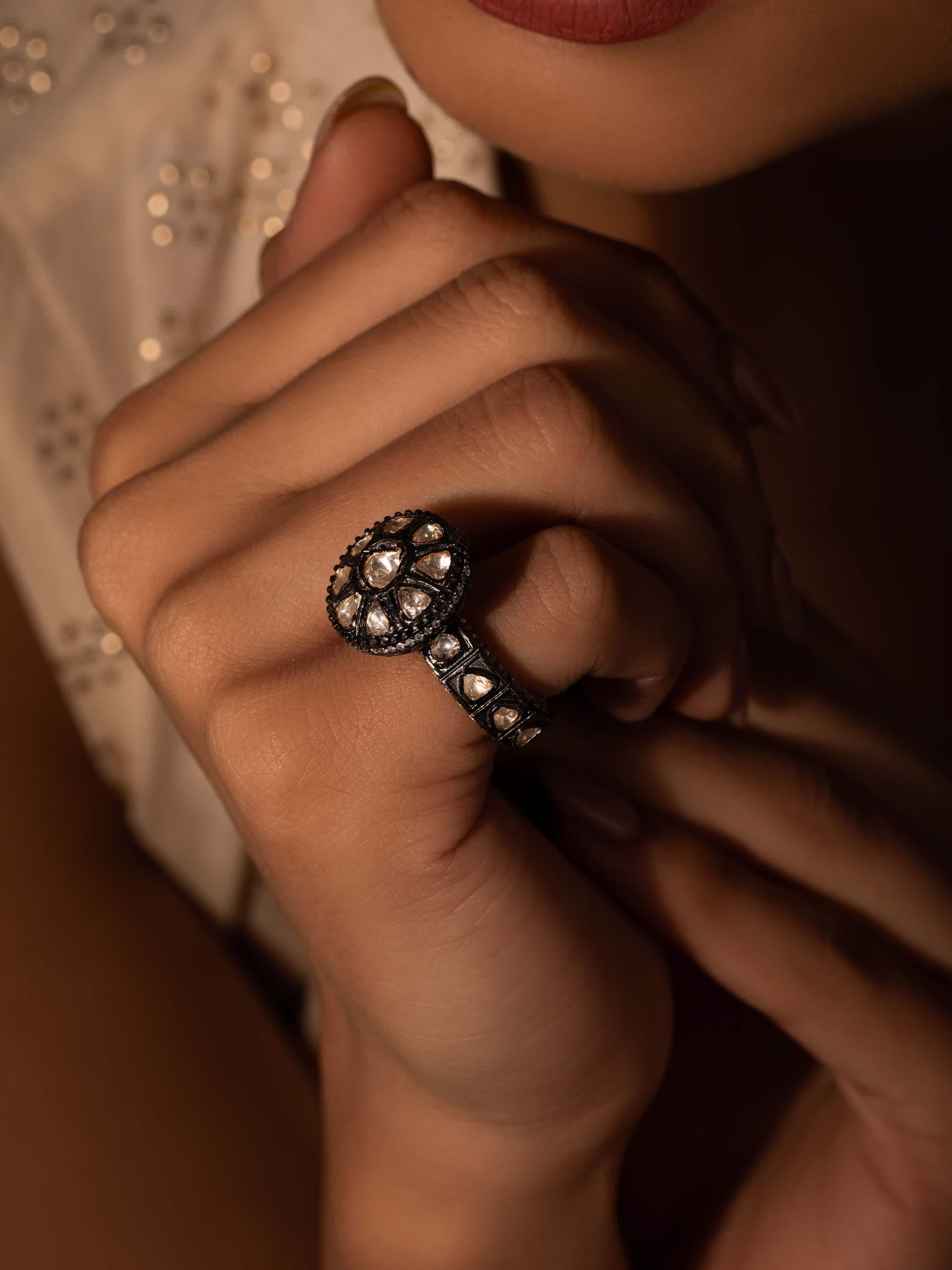 Side view of Silversmithing Women's Ring highlighting detailed silver craftsmanship and ring shape.