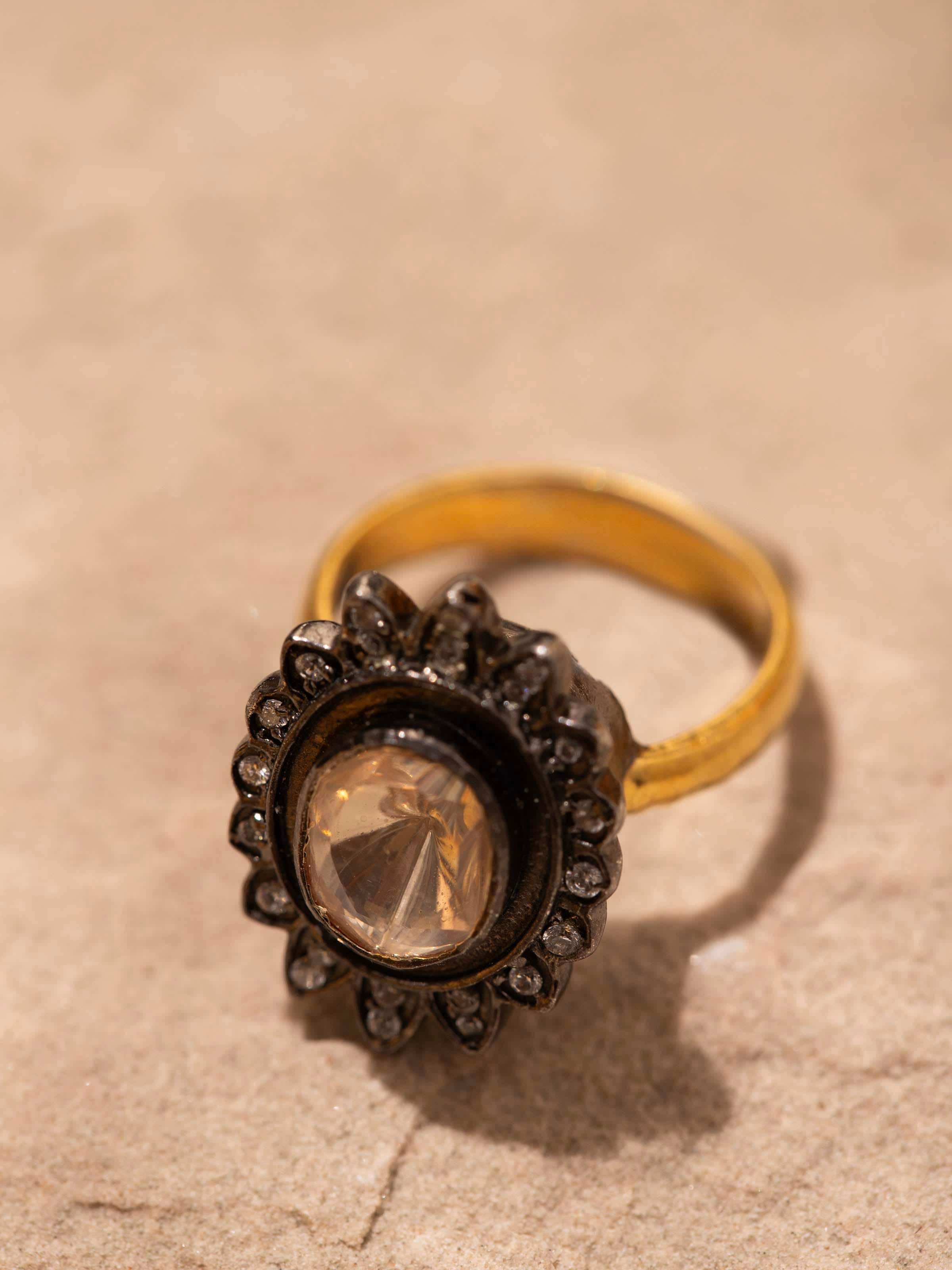 Angled view of Silversmithing Women's Ring showcasing its elegant design and smooth silver surface