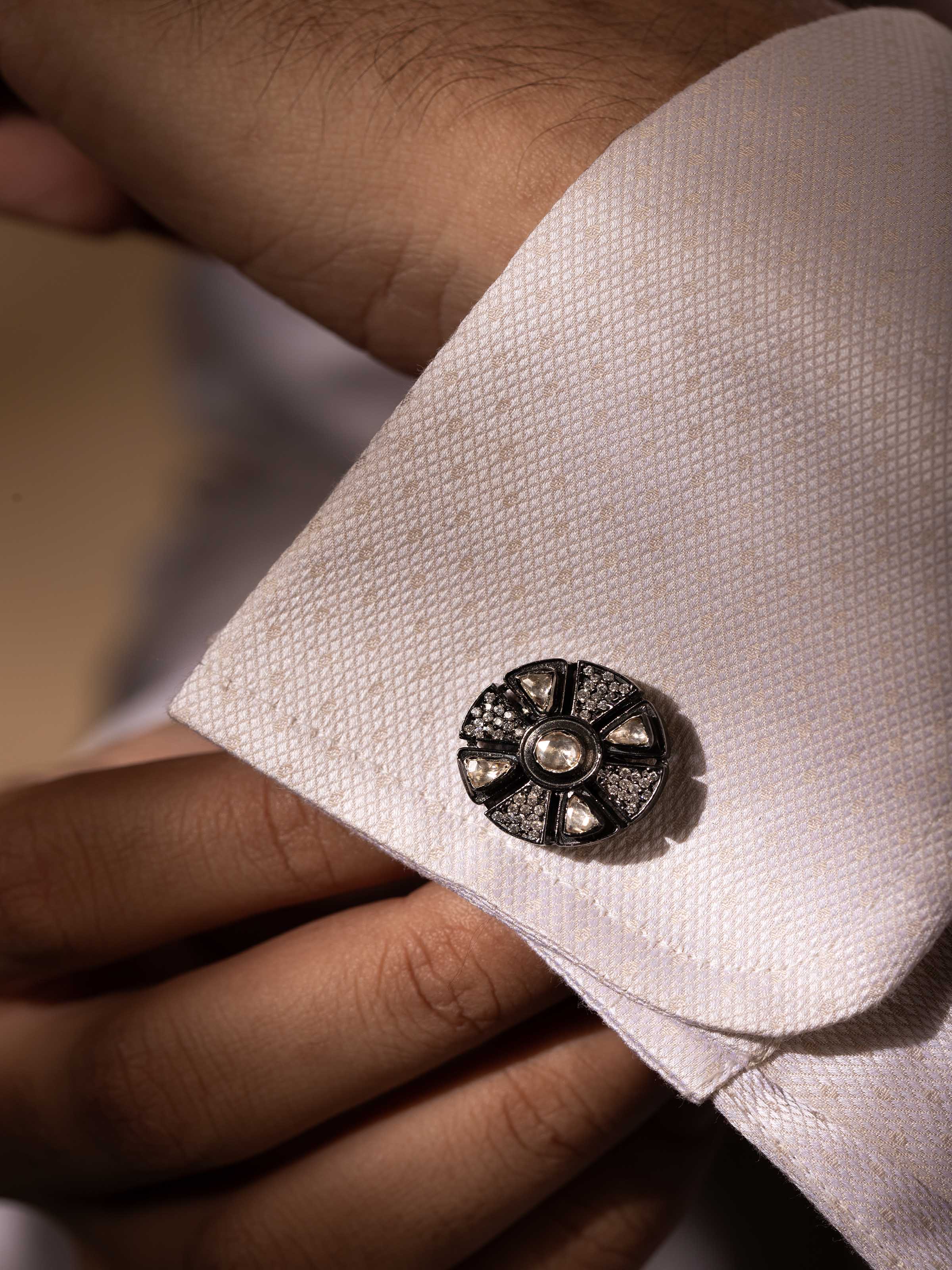 Close-up showcasing the texture and finish of the cufflinks