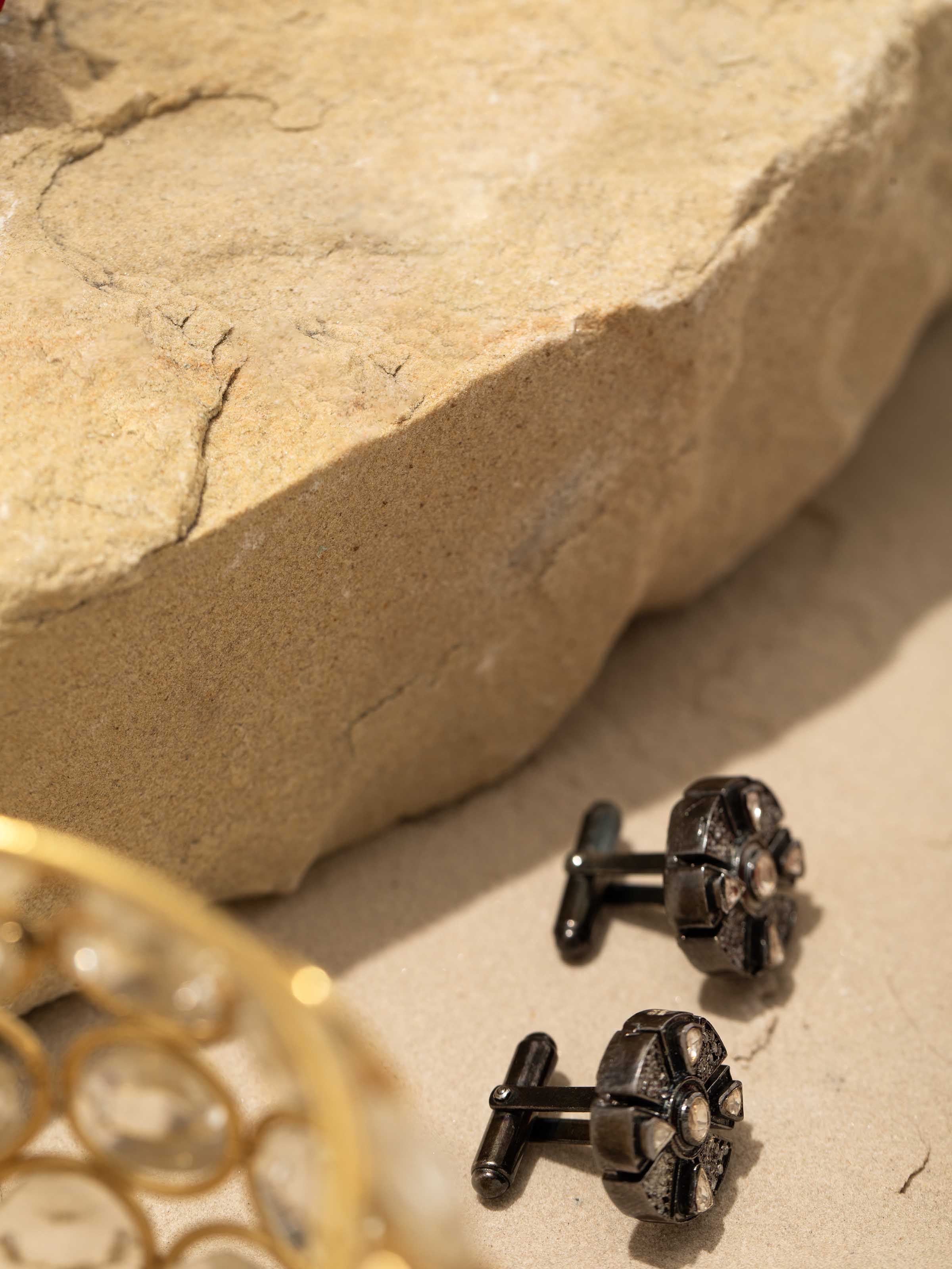 Artistic detail shot emphasizing the fine silver smithing work