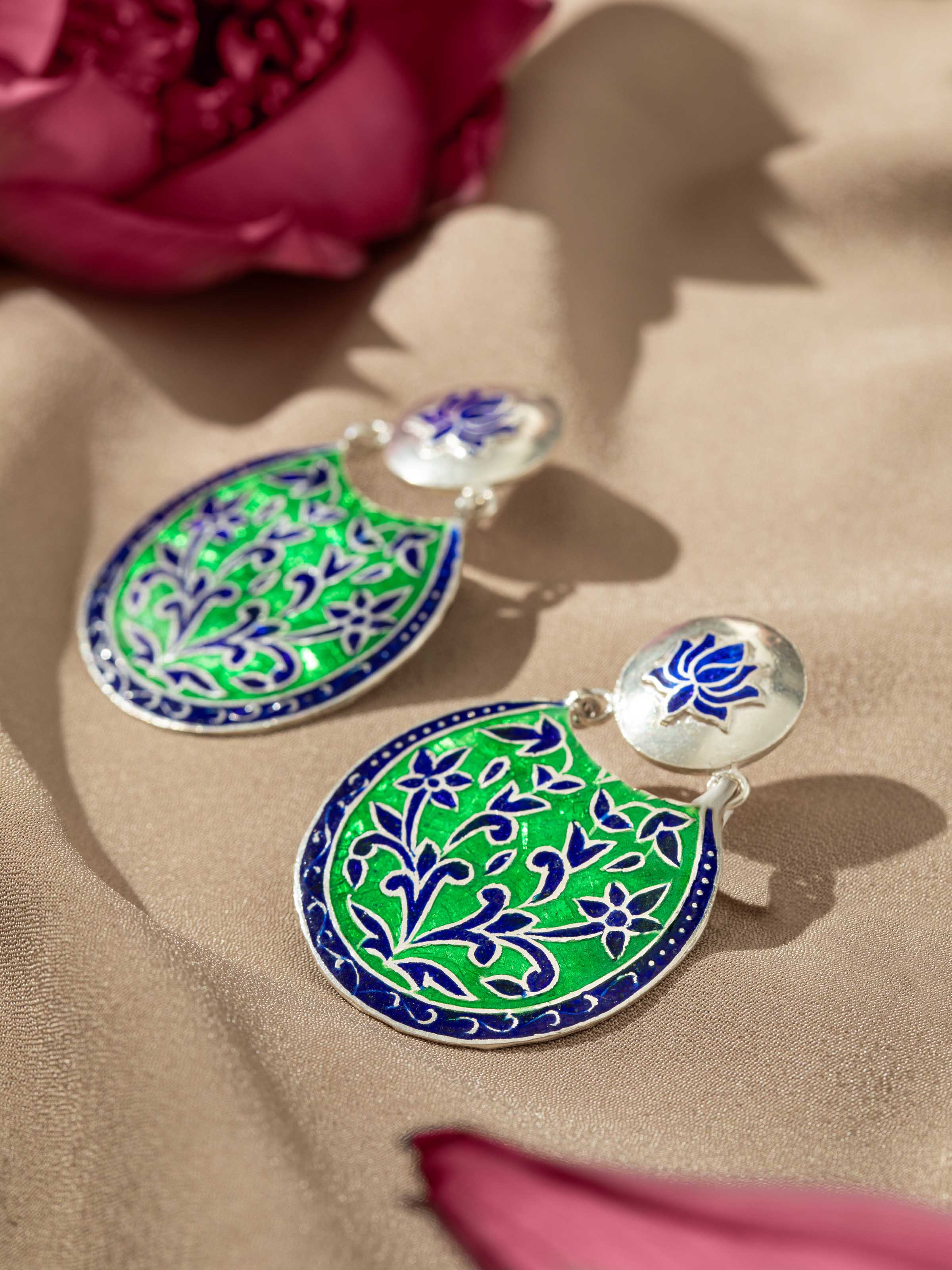 Detailed view of Blue Meenakari Silver Drop Earrings showcasing the intricate silverwork and vibrant blue enamel.