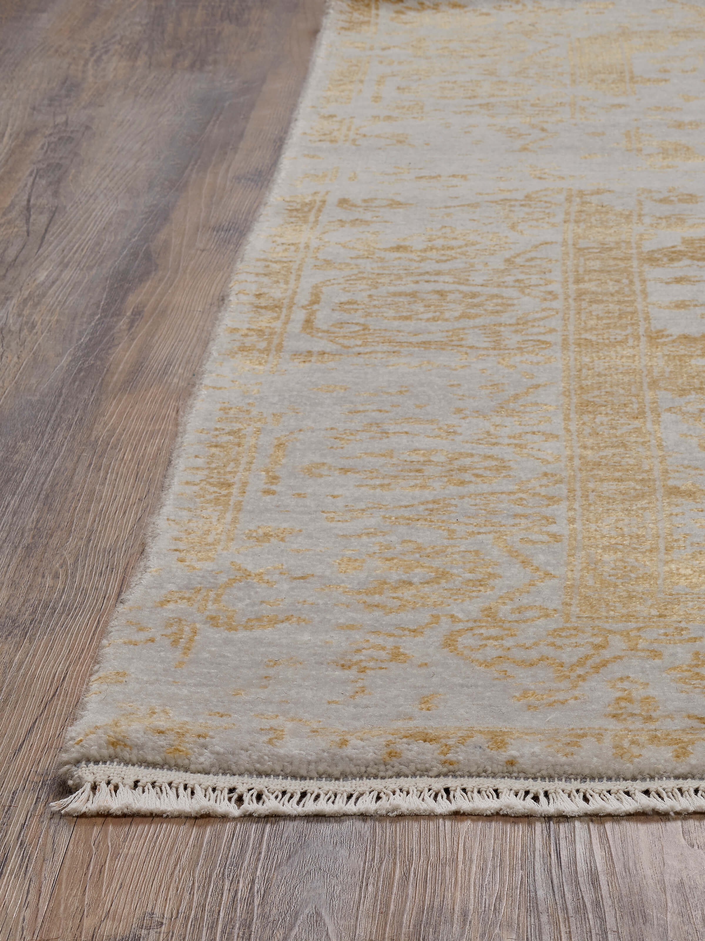 Overhead view of Distressed Transitional Grey Gold Agra Wool & Viscose Hand-Knotted Rug, highlighting the full design and color scheme.
