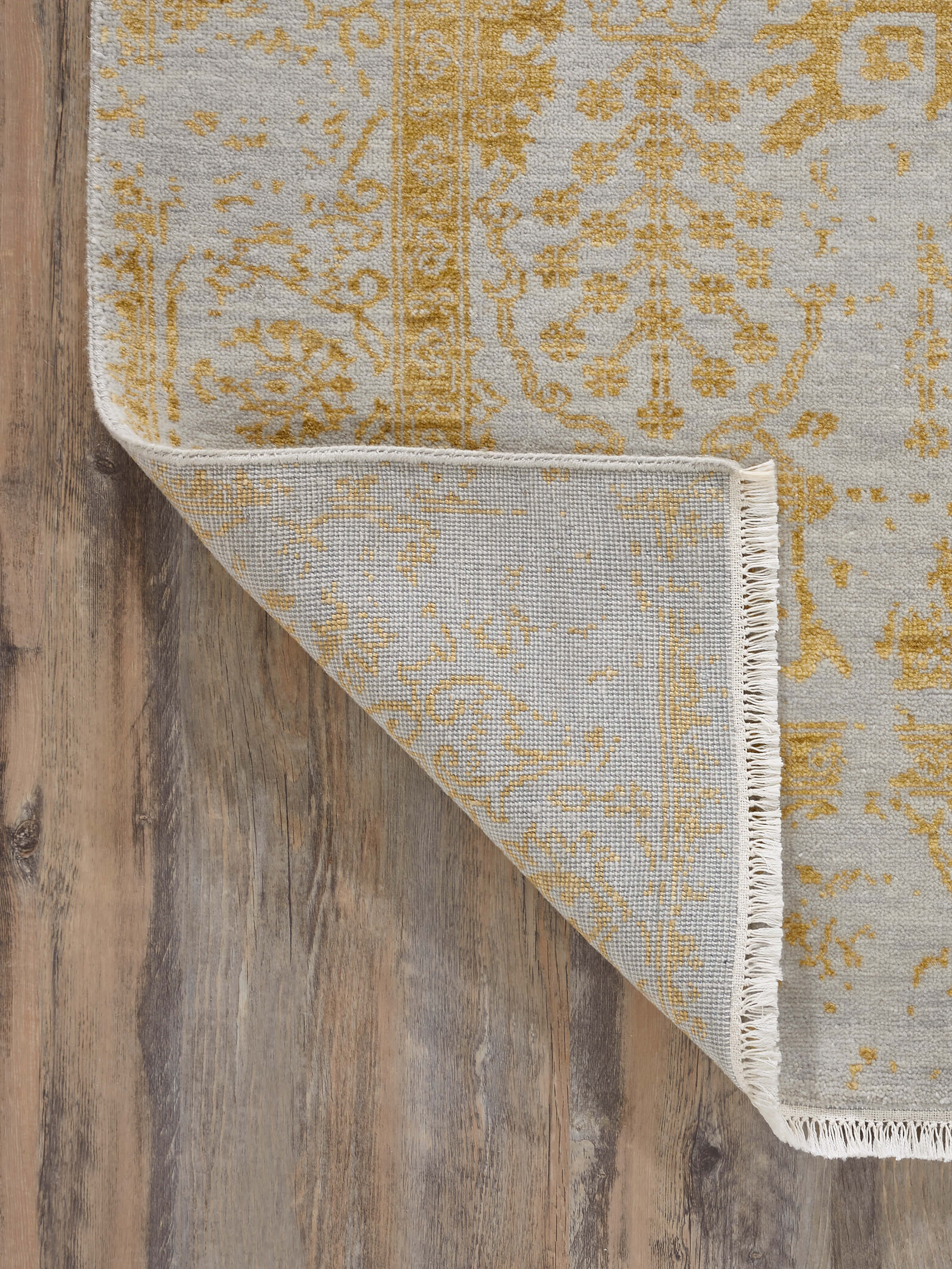 Full shot of Distressed Transitional Grey Gold Agra Wool & Viscose Hand-Knotted Rug, demonstrating the rug's overall design and luxurious feel.