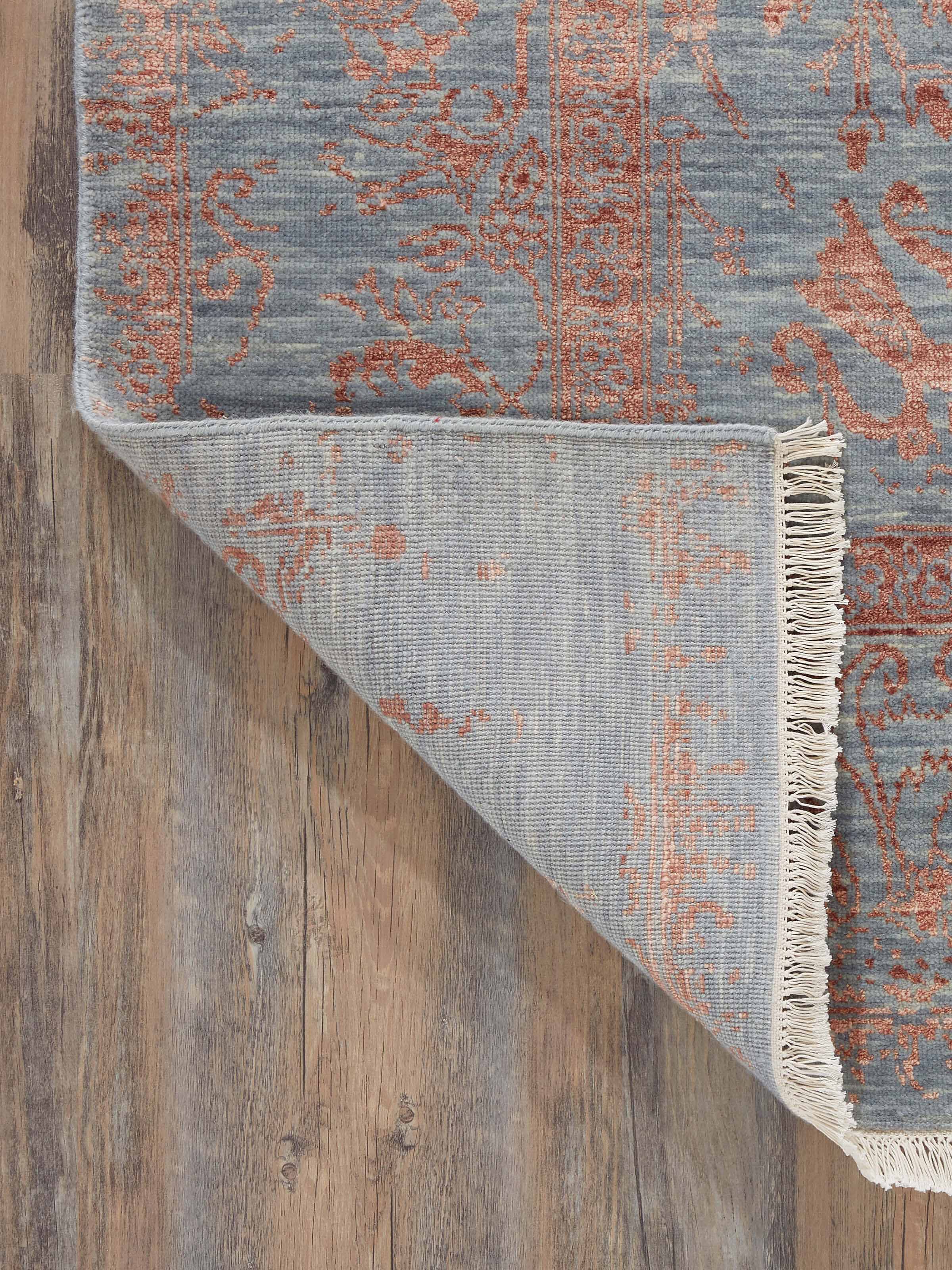 Full view of the Distressed transitional dark grey copper Agra rug in a room setting to show scale and style