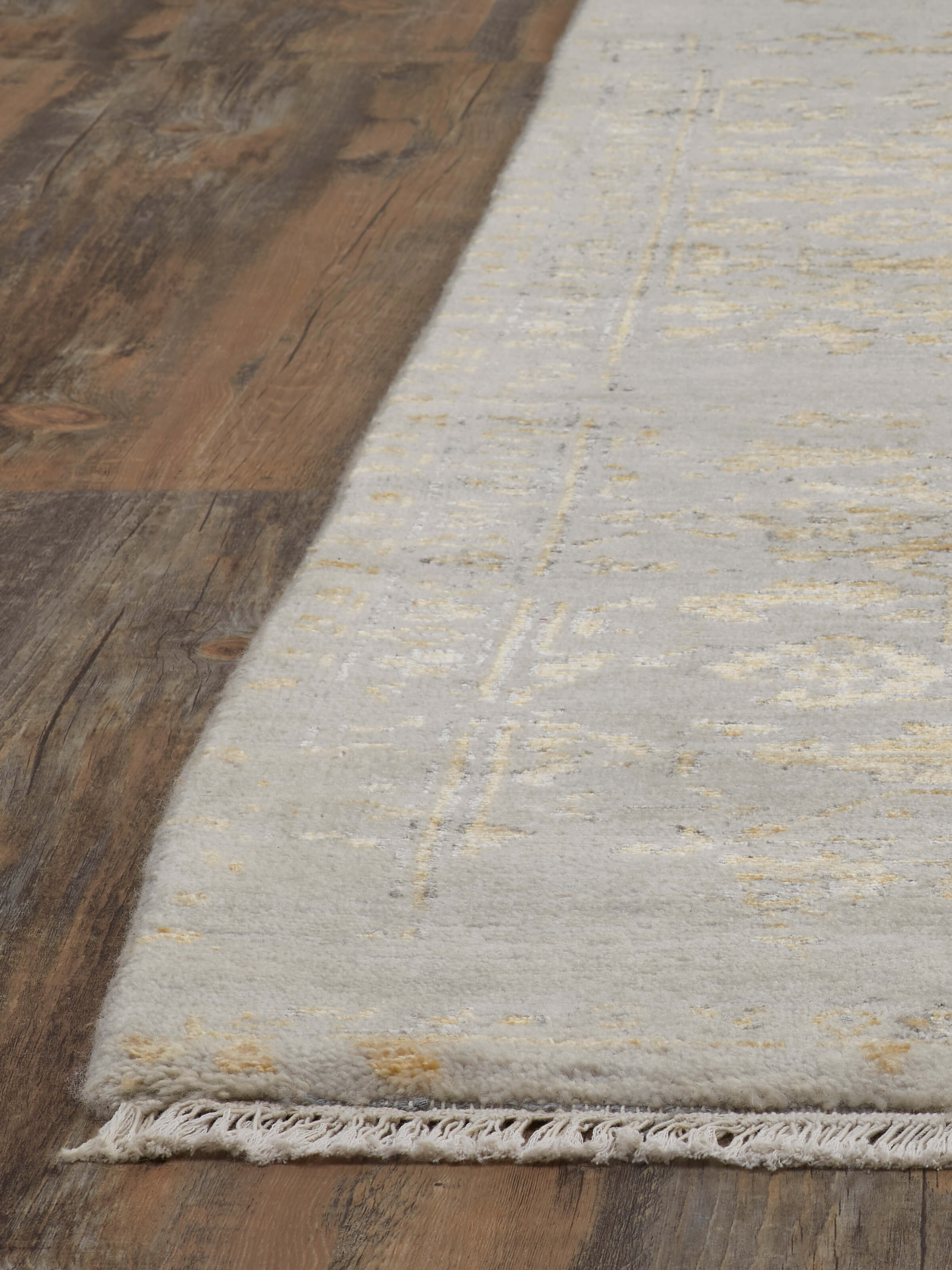 Full view of the distressed transitional grey Agra wool & viscose hand-knotted rug, illustrating its size and aesthetic appeal