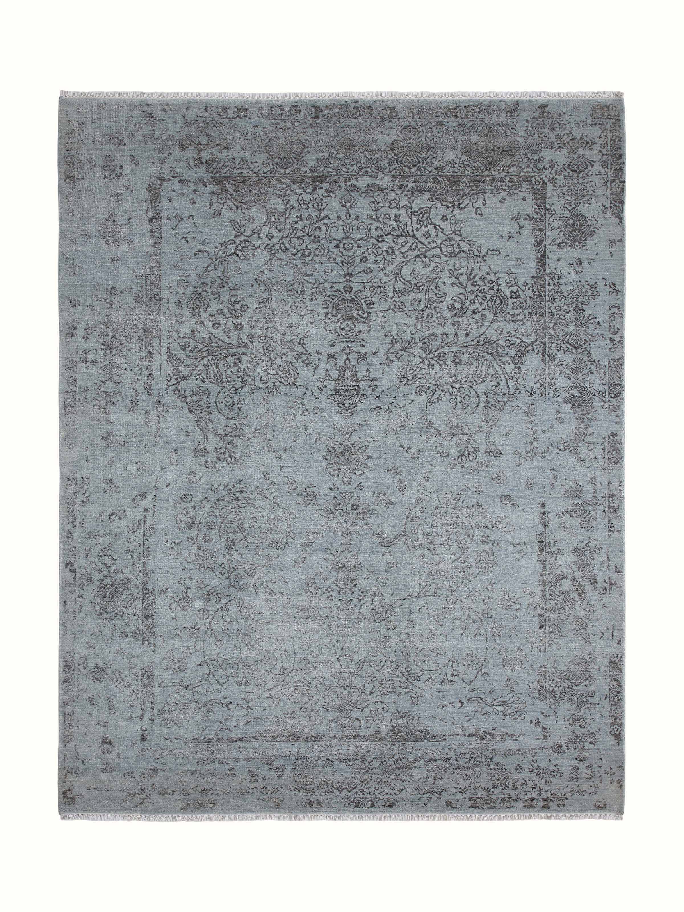 Detailed view of Distressed Transitional Blue Charcoal Agra Wool & Viscose Hand-Knotted Rug showing its intricate pattern.