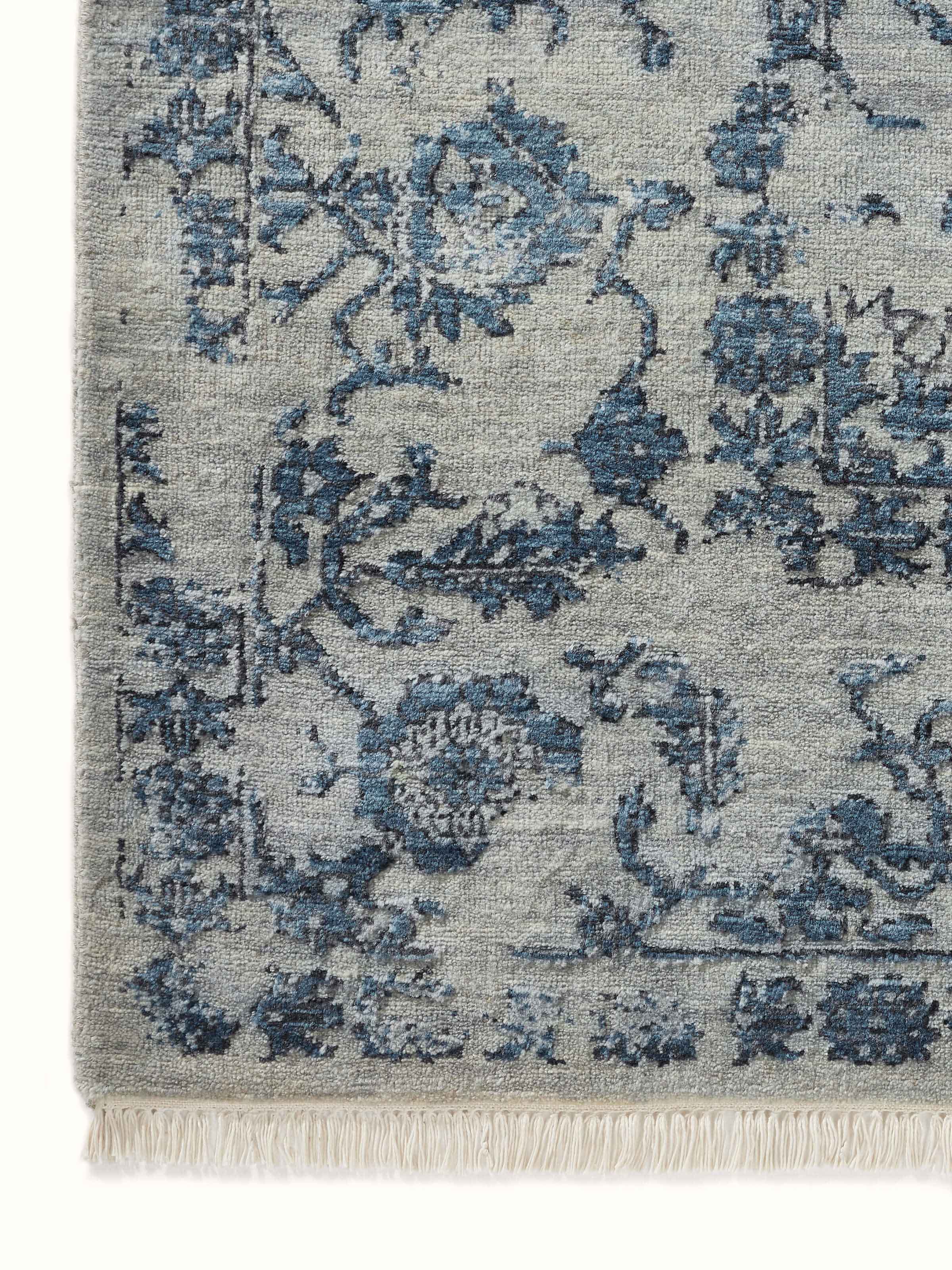 Detailed close-up of the weave and distressed texture of Swadesh Agra Grey Blue Wool Hand-knotted Rug.